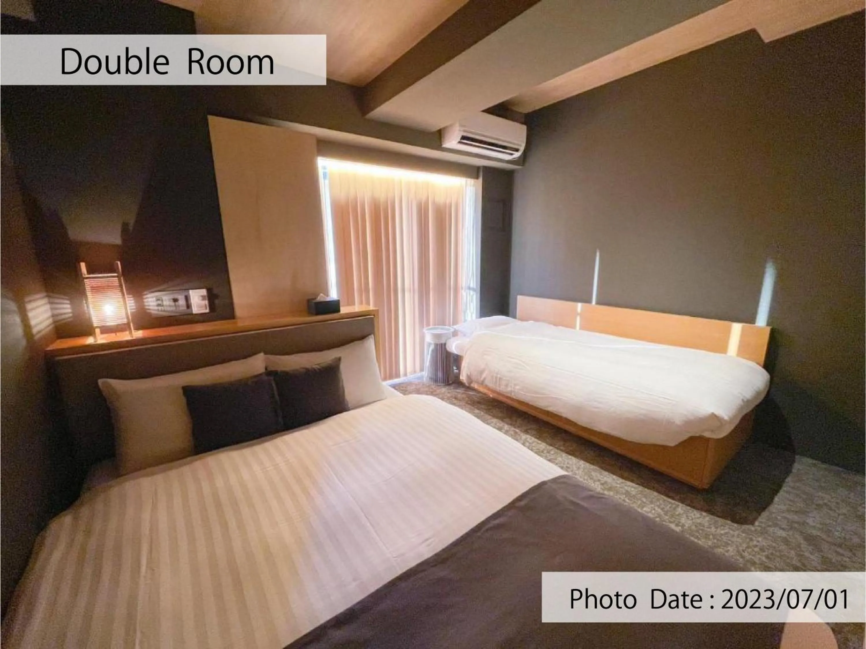 Bed in HOTEL TOMOS ASAKUSA