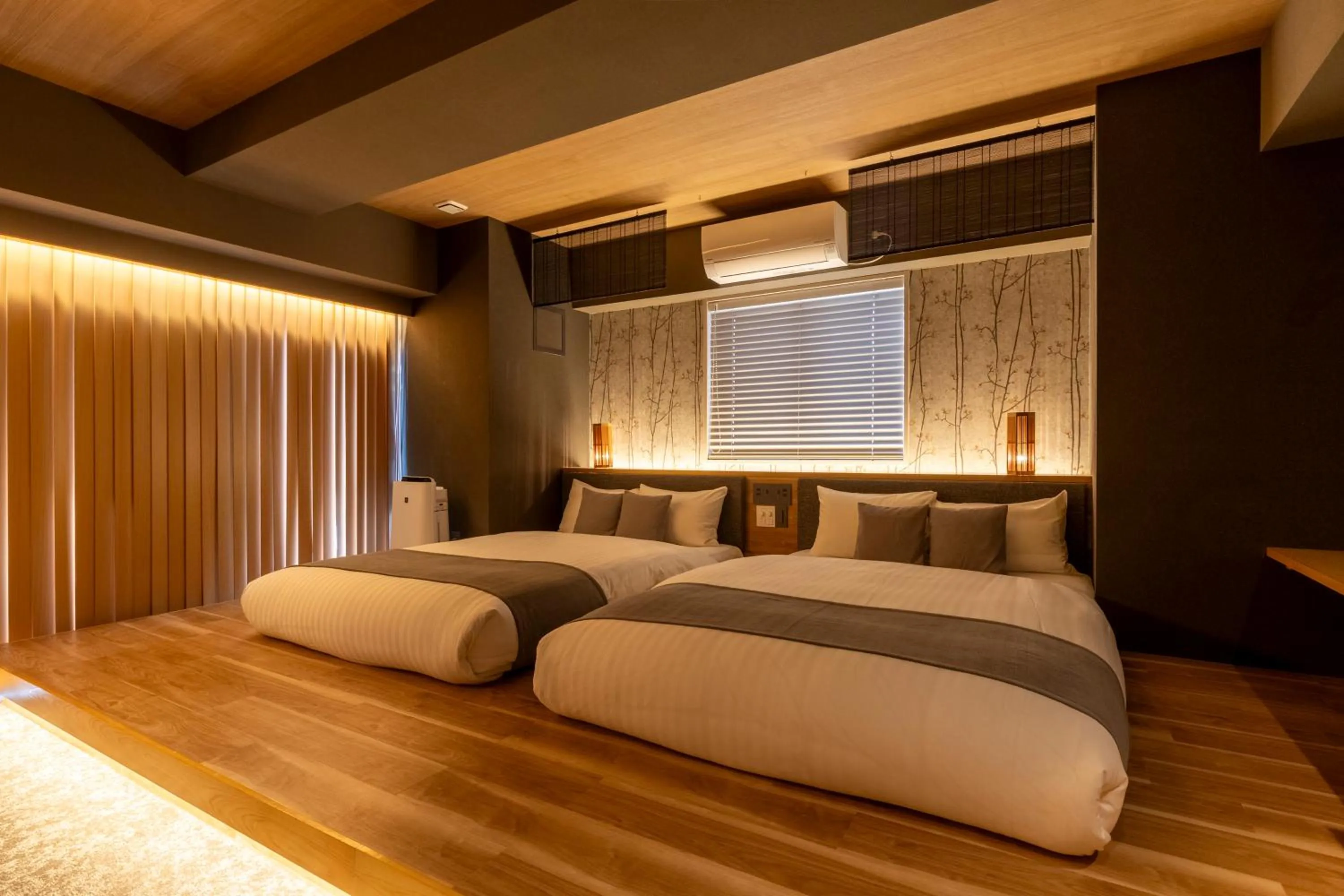 Bed in HOTEL TOMOS ASAKUSA