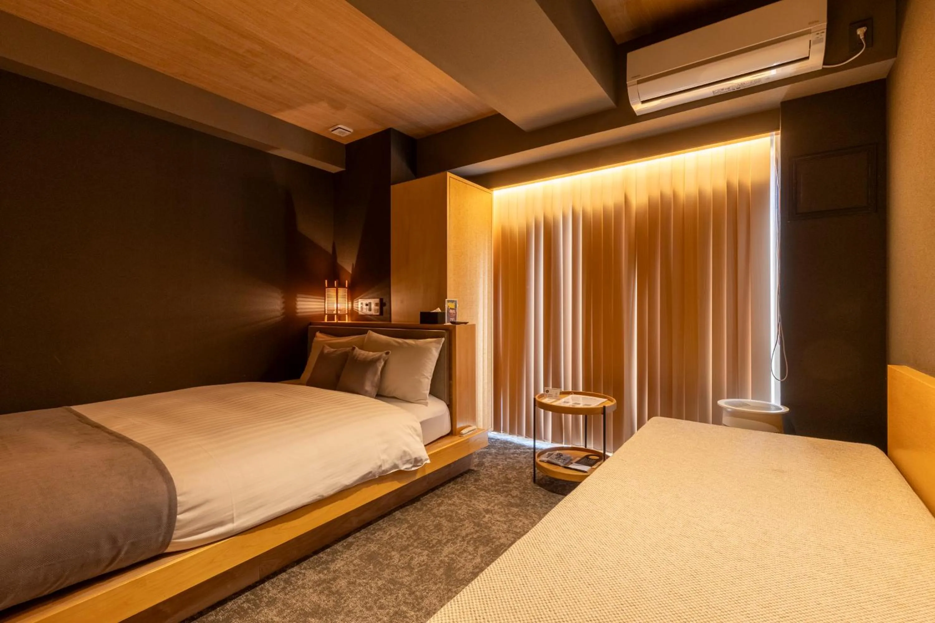 Bed in HOTEL TOMOS ASAKUSA