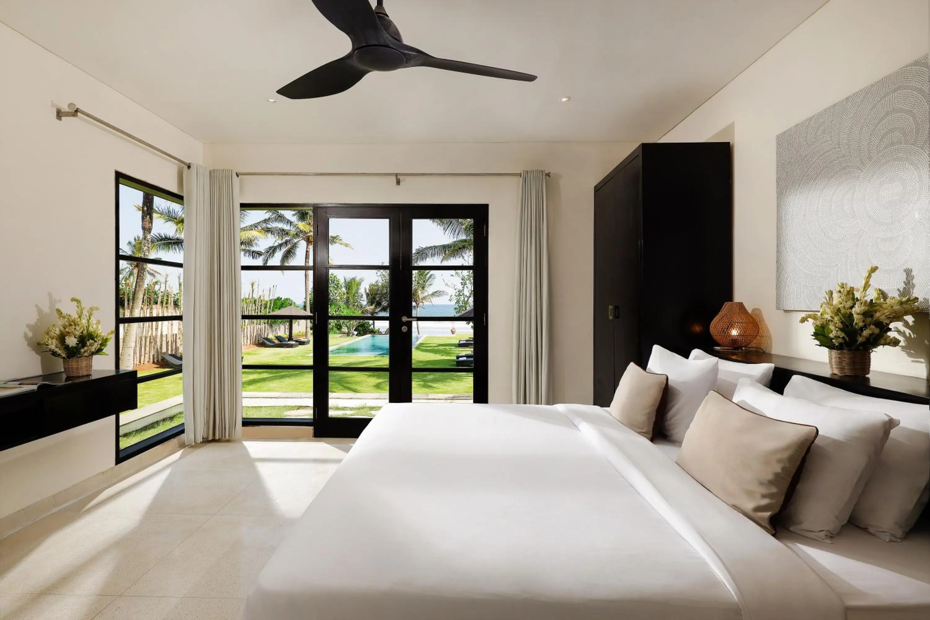 Bed in Black Beach Villa - Absolute Beachfront Escape