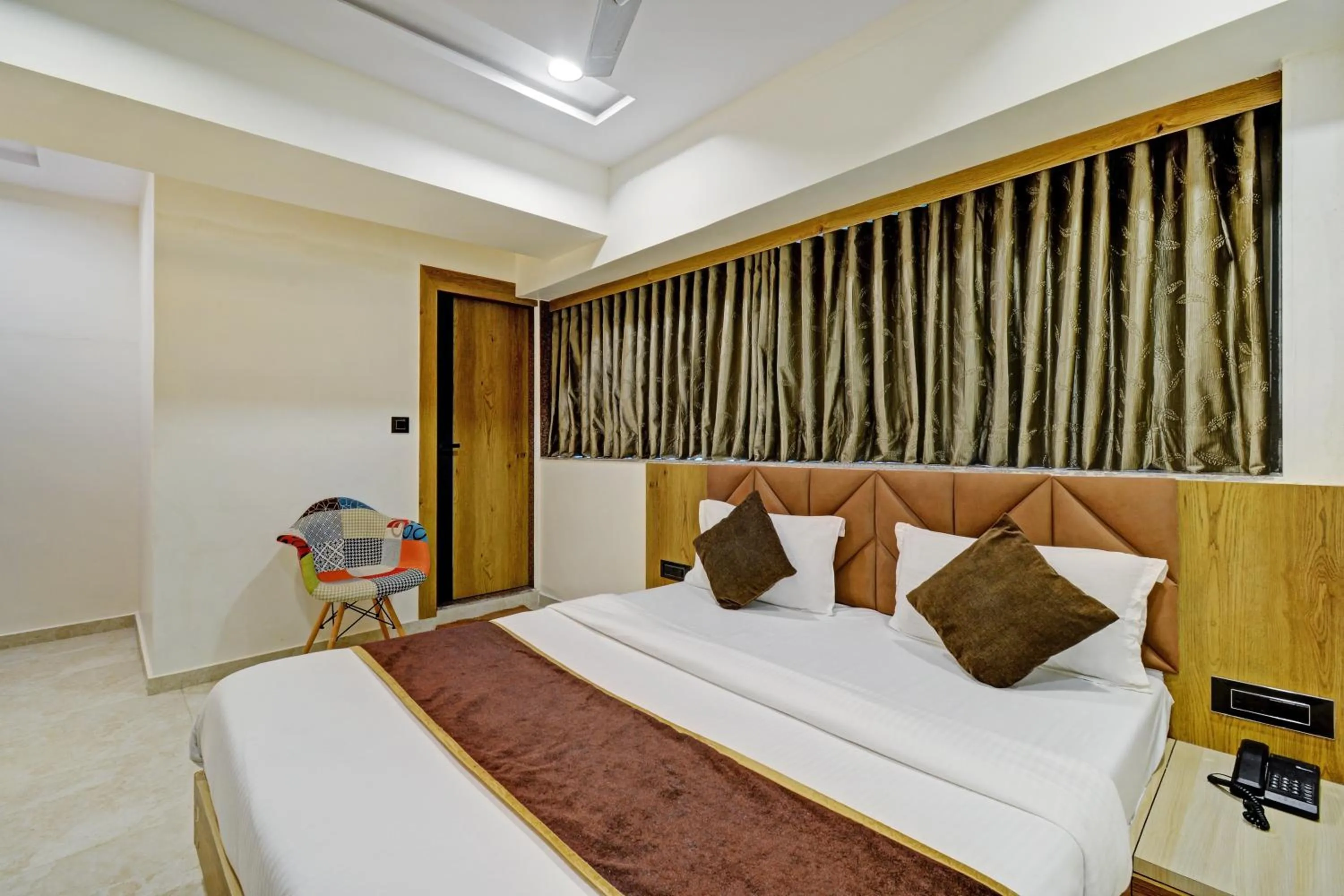 Photo of the whole room, Bed in Hotel Royal Ican Sindhubhavan Road