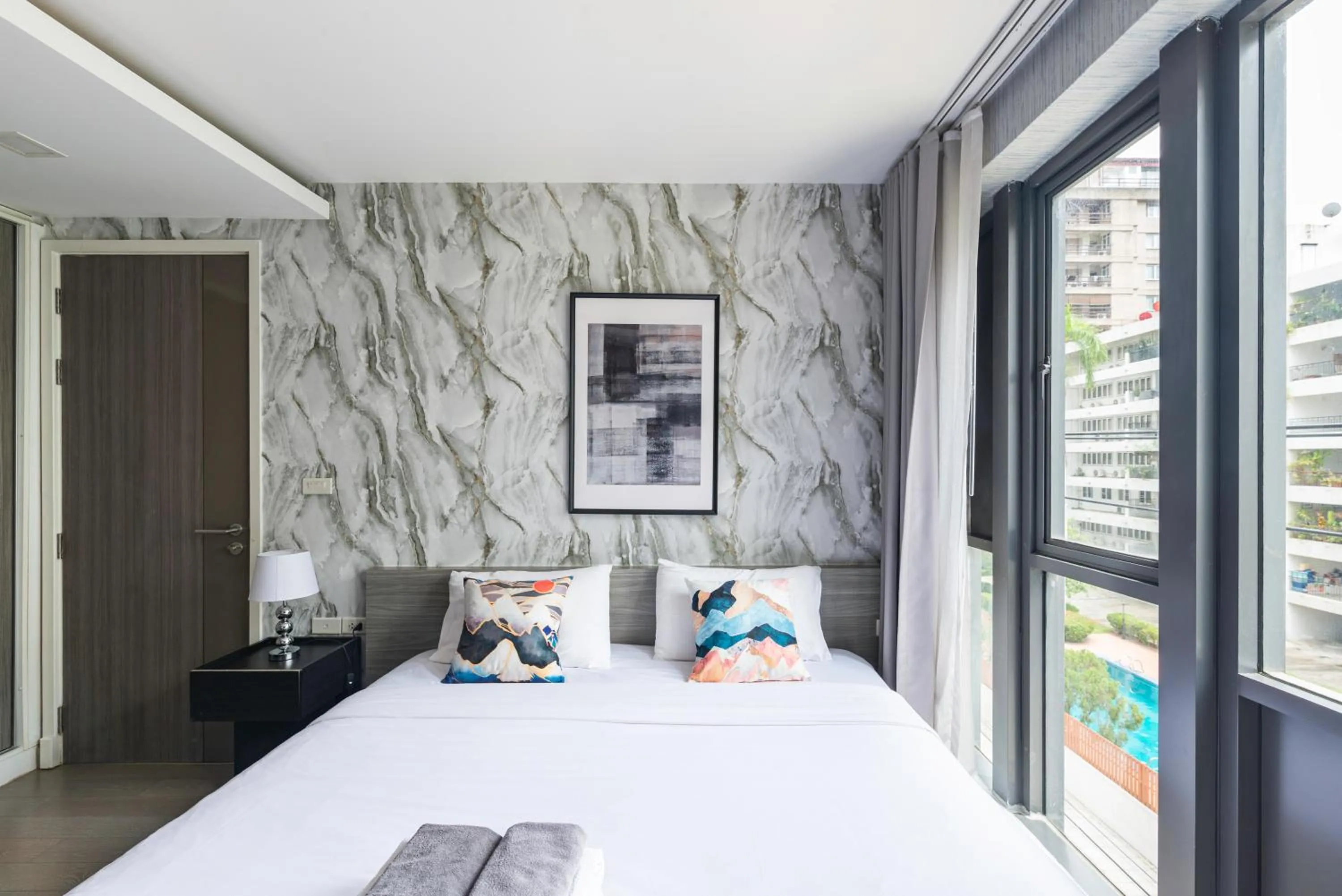 Bed in Dazzle Sukhumvit 7 by LeFoyer