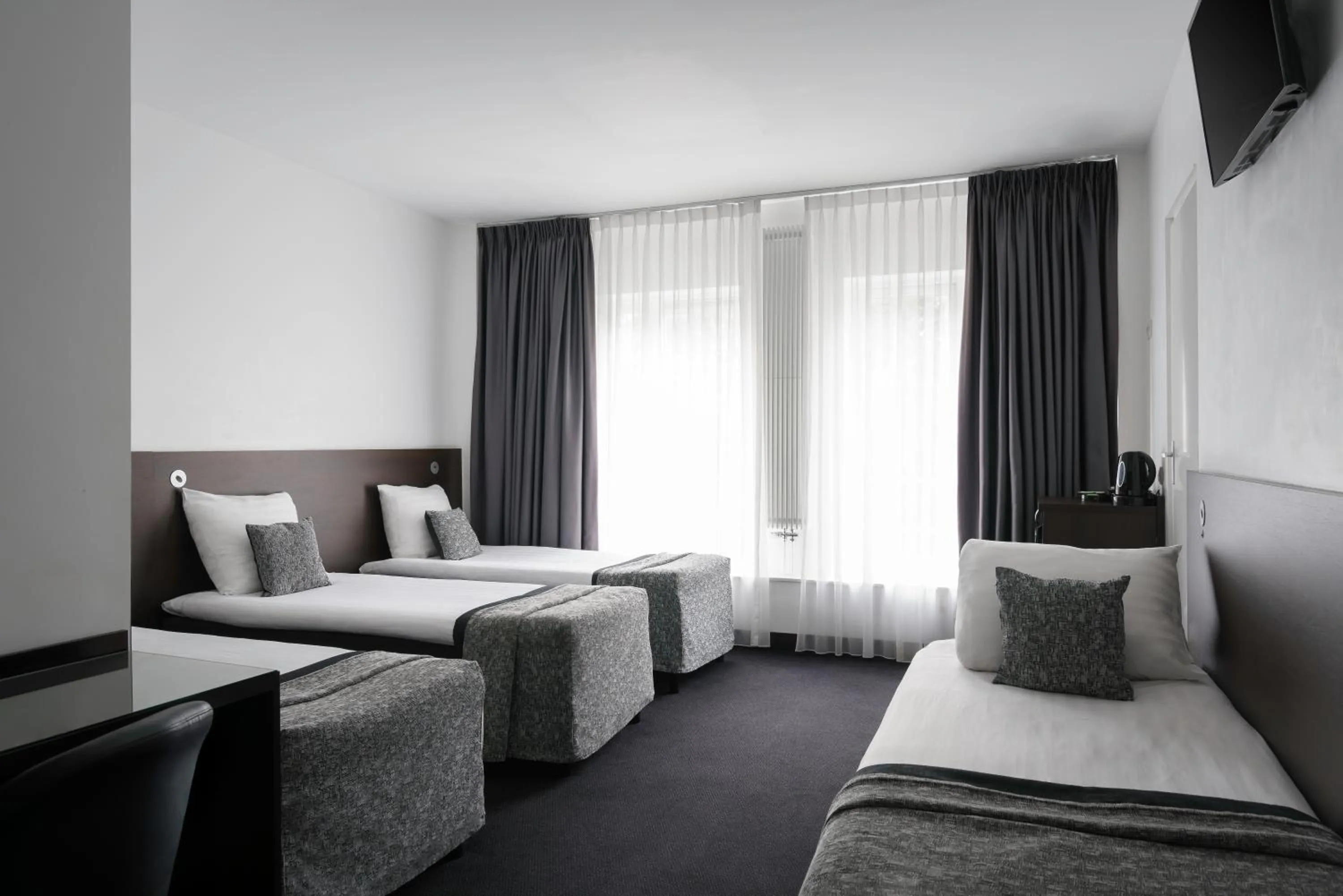 Bed in Hotel City Garden Amsterdam