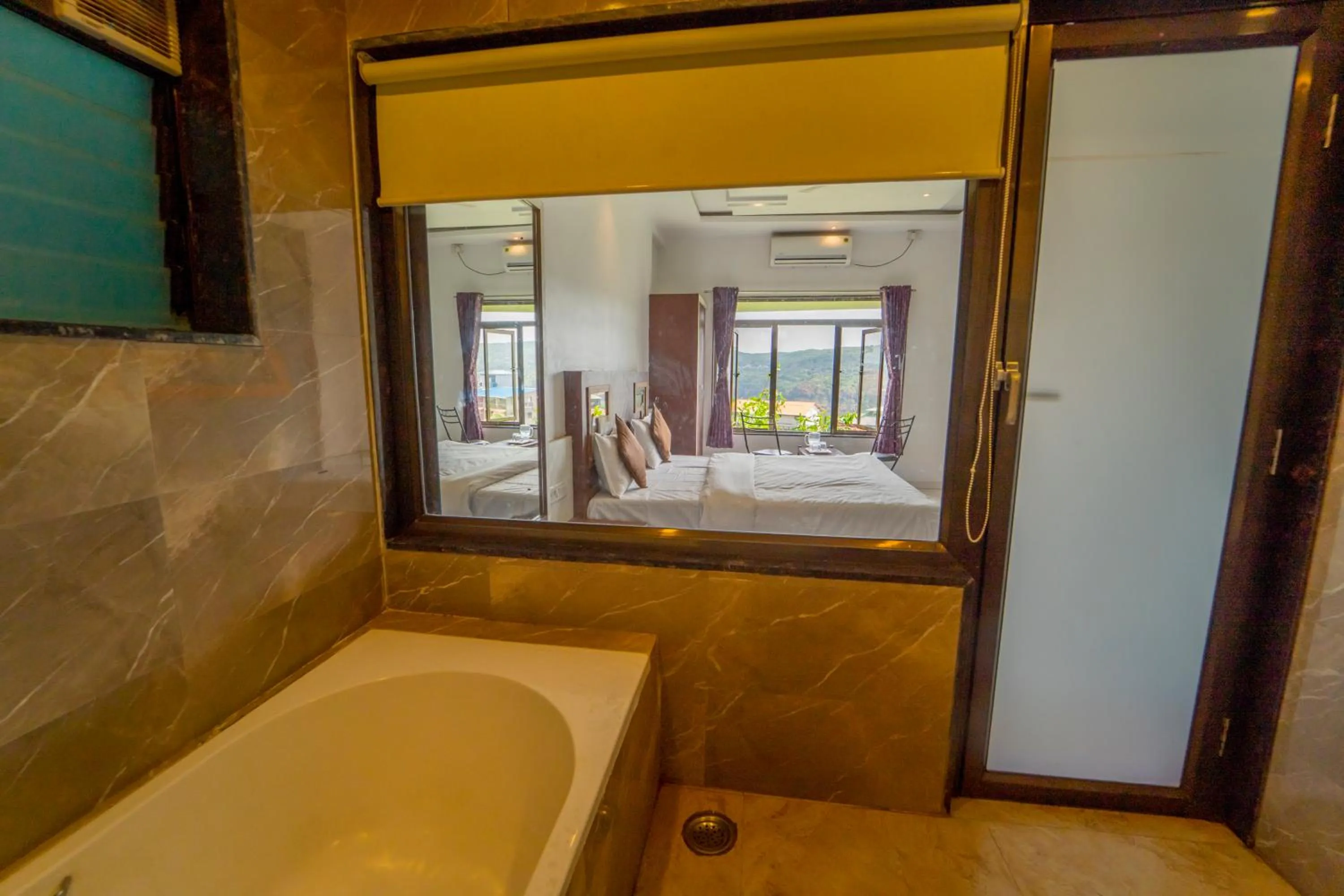 Bath, Bed in Veggies Residency