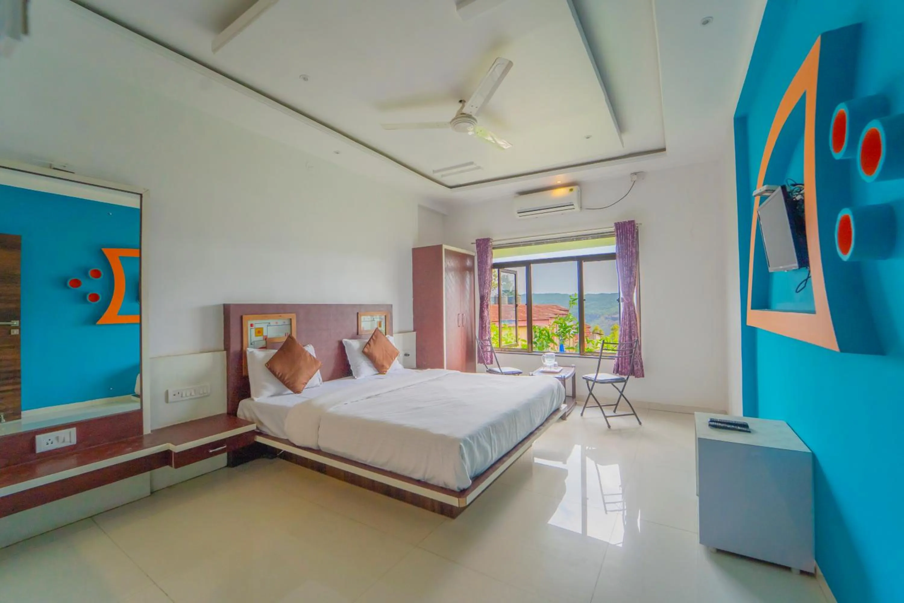 Bed in Veggies Residency