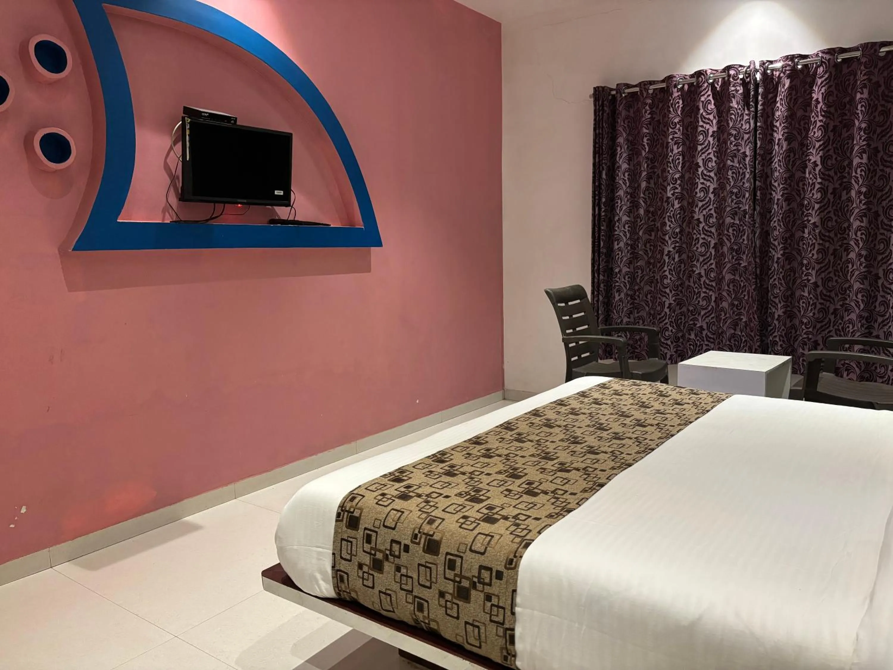 Bed in Veggies Residency