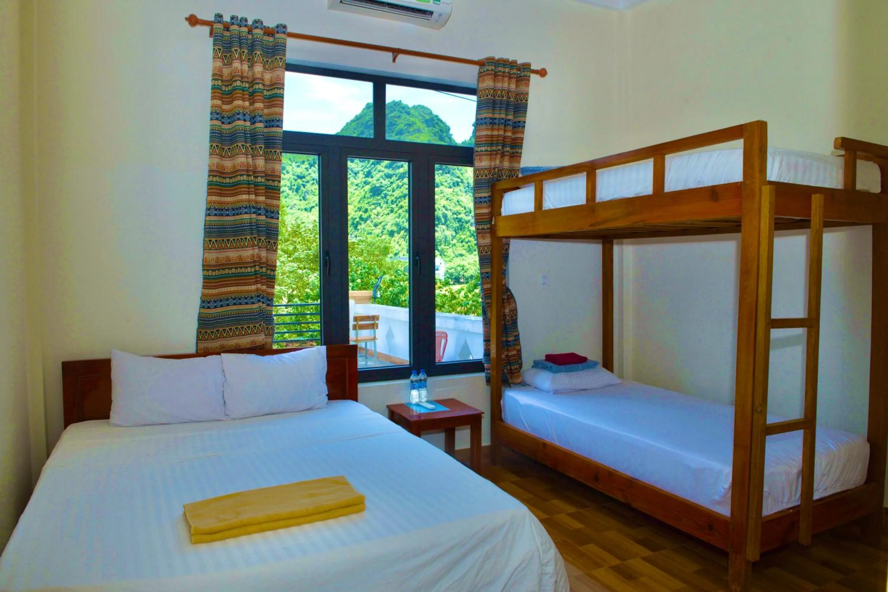 Bed in YoLo Pool Bar Villas & Garden Restaurant