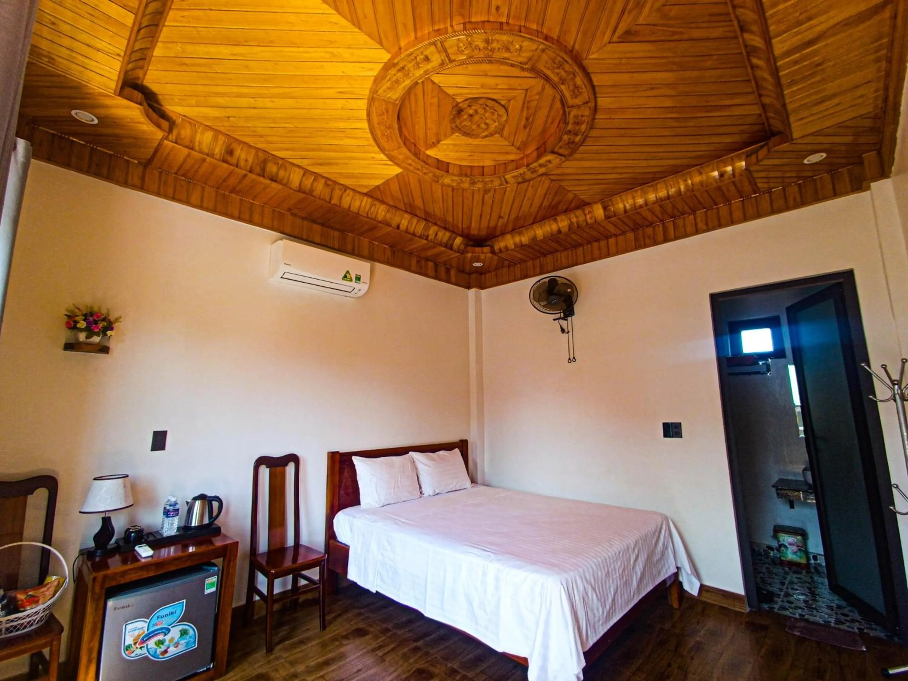 Bed in YoLo Pool Bar Villas & Garden Restaurant