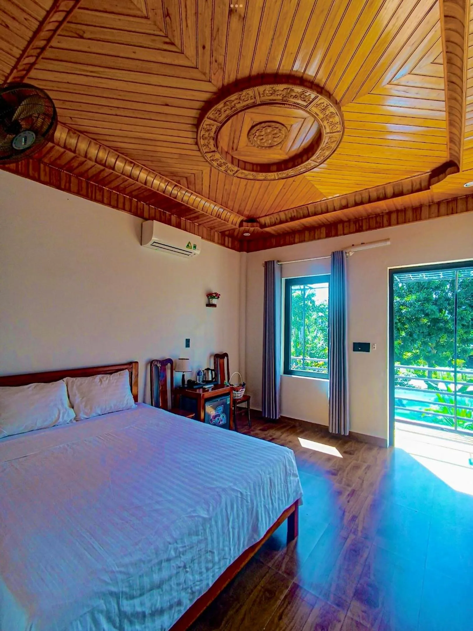 Bed in YoLo Pool Bar Villas & Garden Restaurant