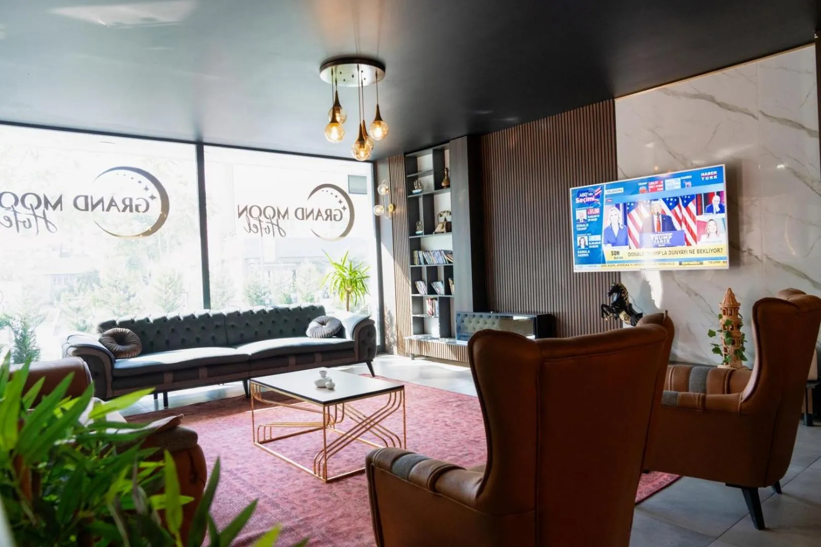 Communal lounge/ TV room in GRAND MOON HOTEL