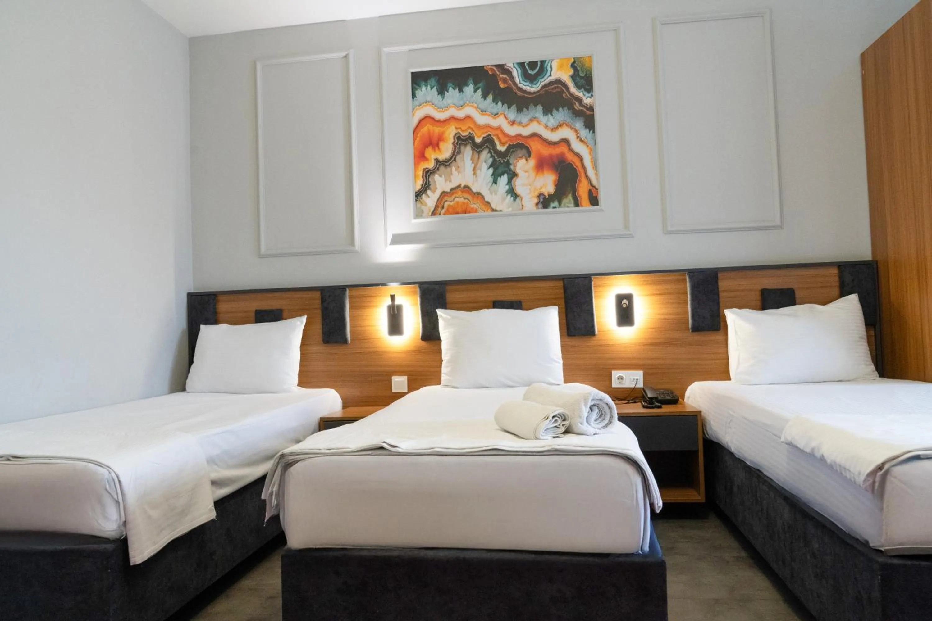 Bed in GRAND MOON HOTEL