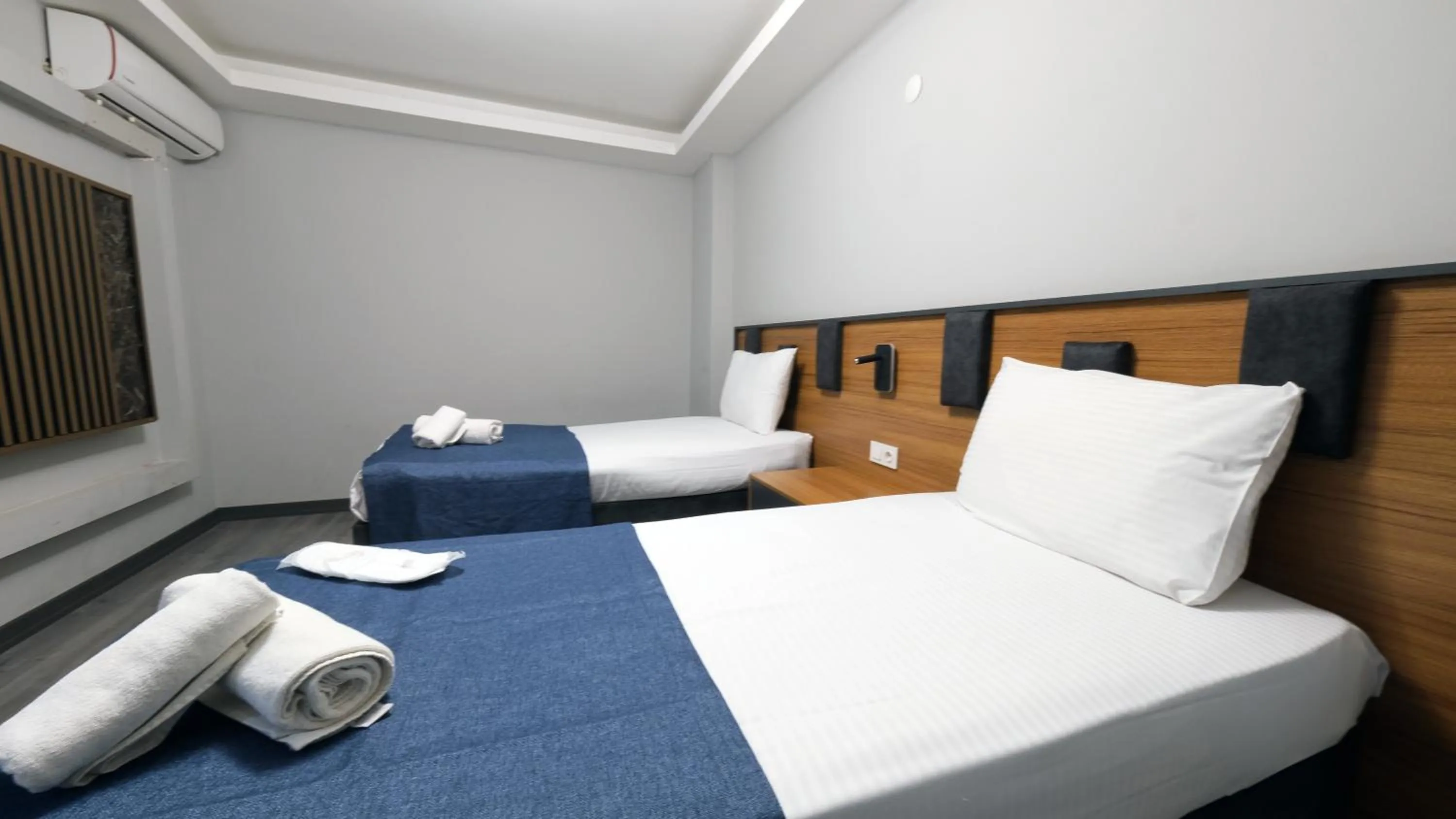 Bed in GRAND MOON HOTEL