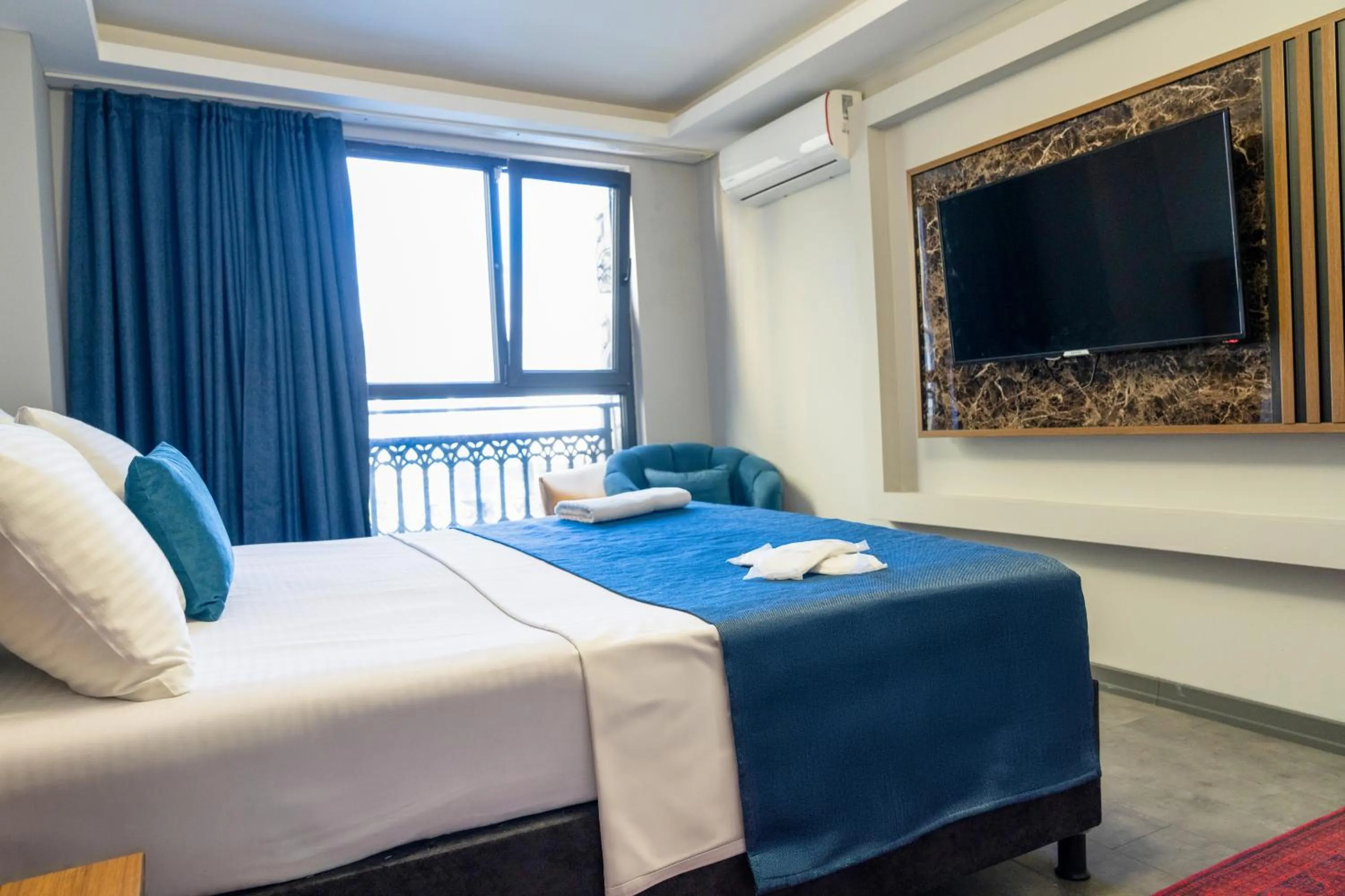 Bed in GRAND MOON HOTEL