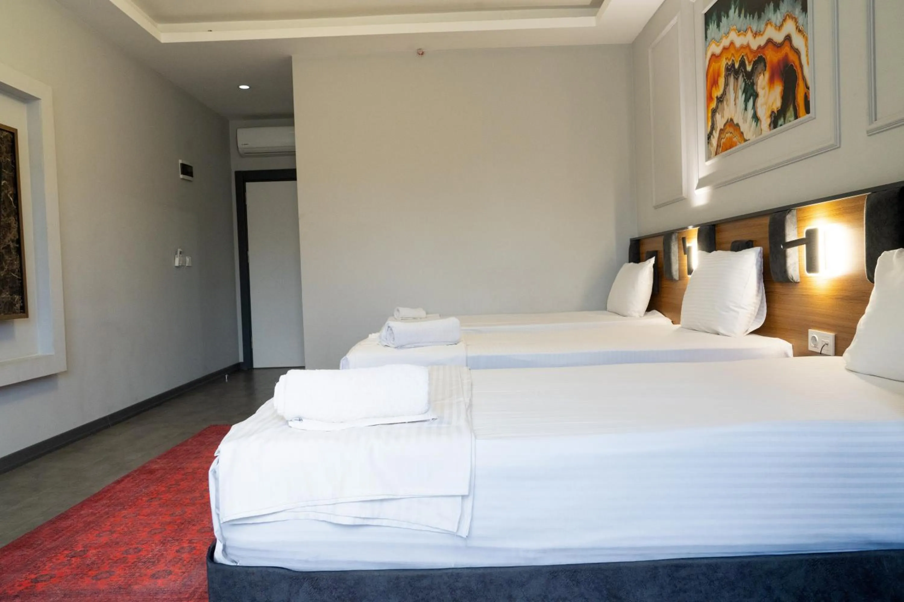 Bed in GRAND MOON HOTEL