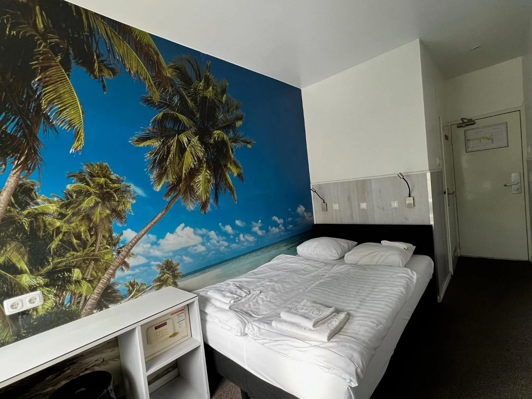 Bed in Budget Trianon Hotel