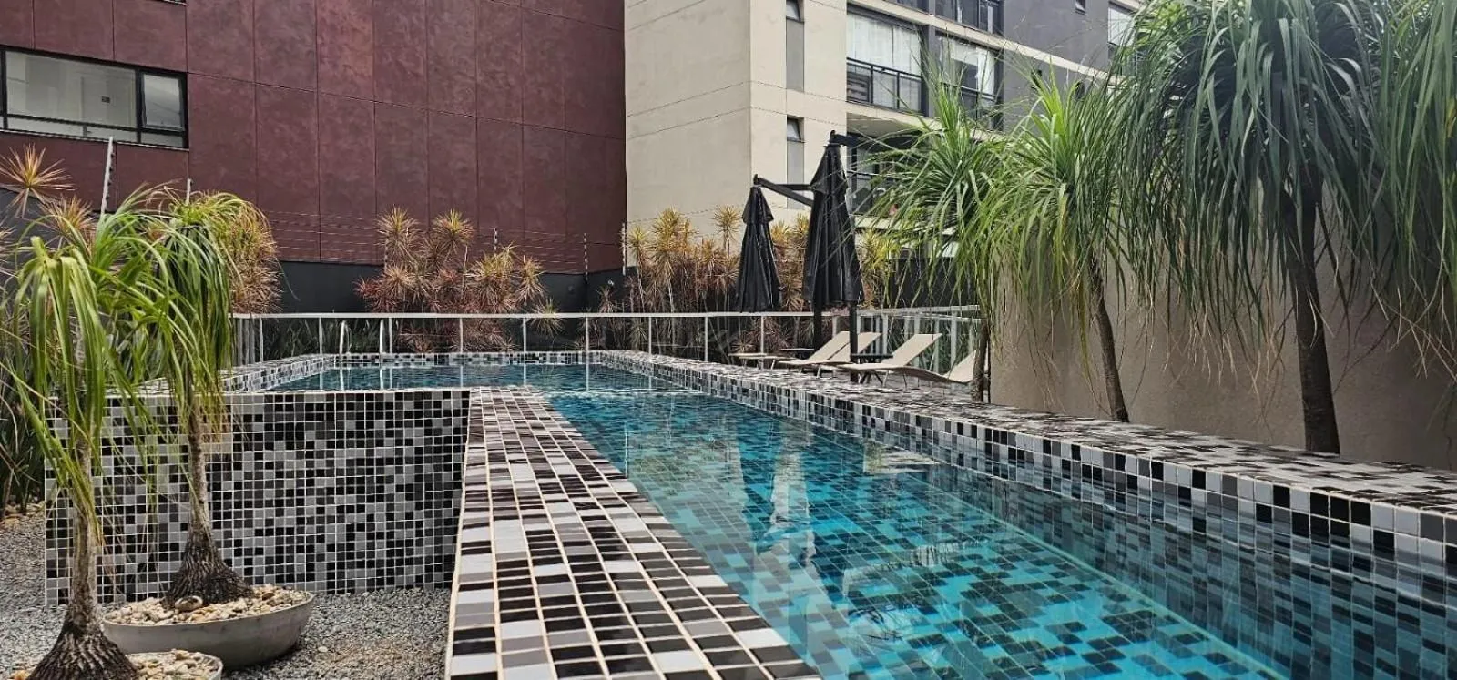Swimming pool in Loft Completo com Cozinha - Quatá - Vila Olímpia