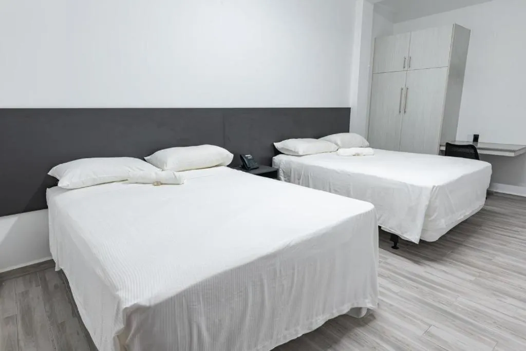 Bed in Hotel Royal Brasil