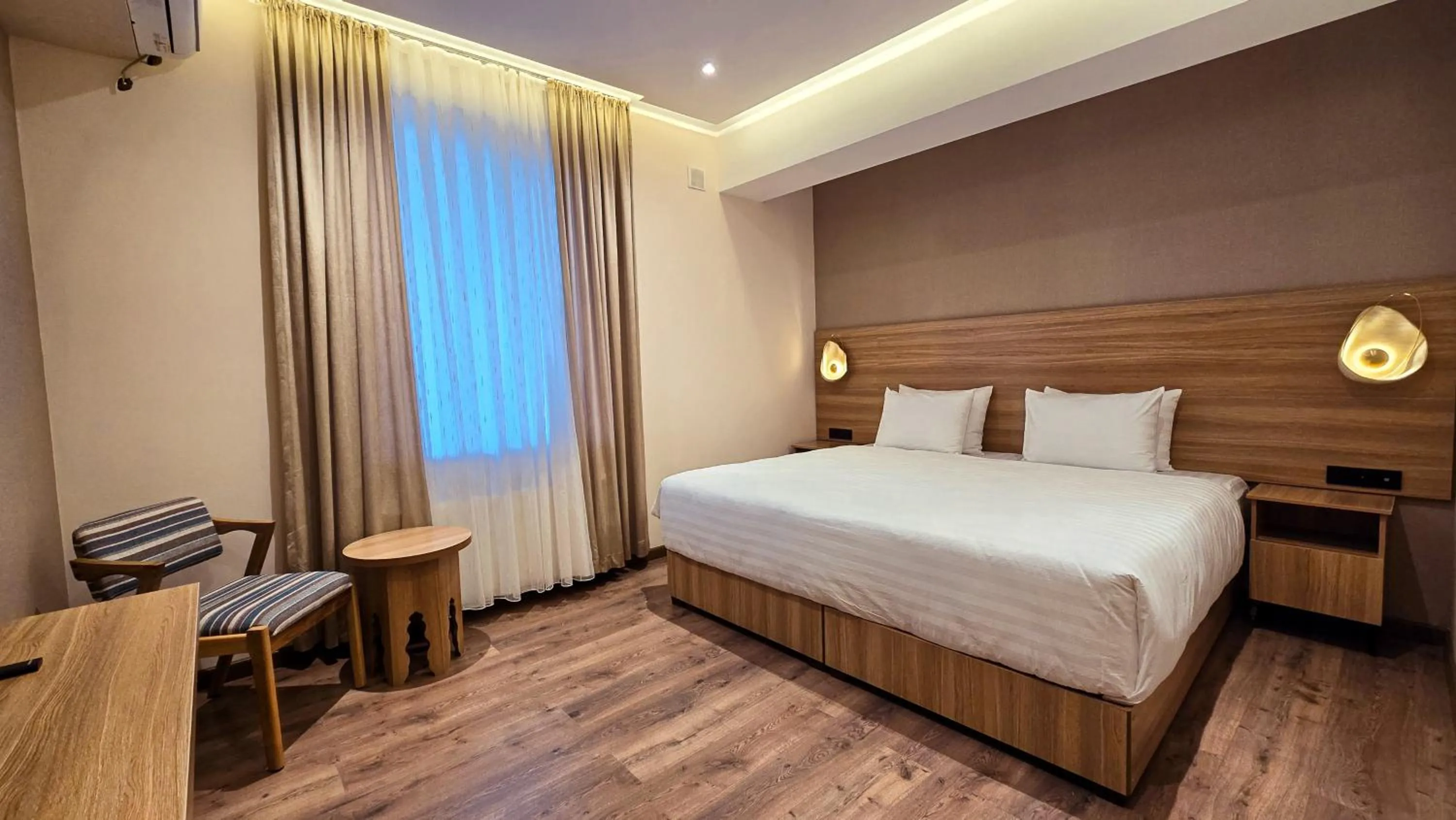 Bed in Hotel Bankir Khiva