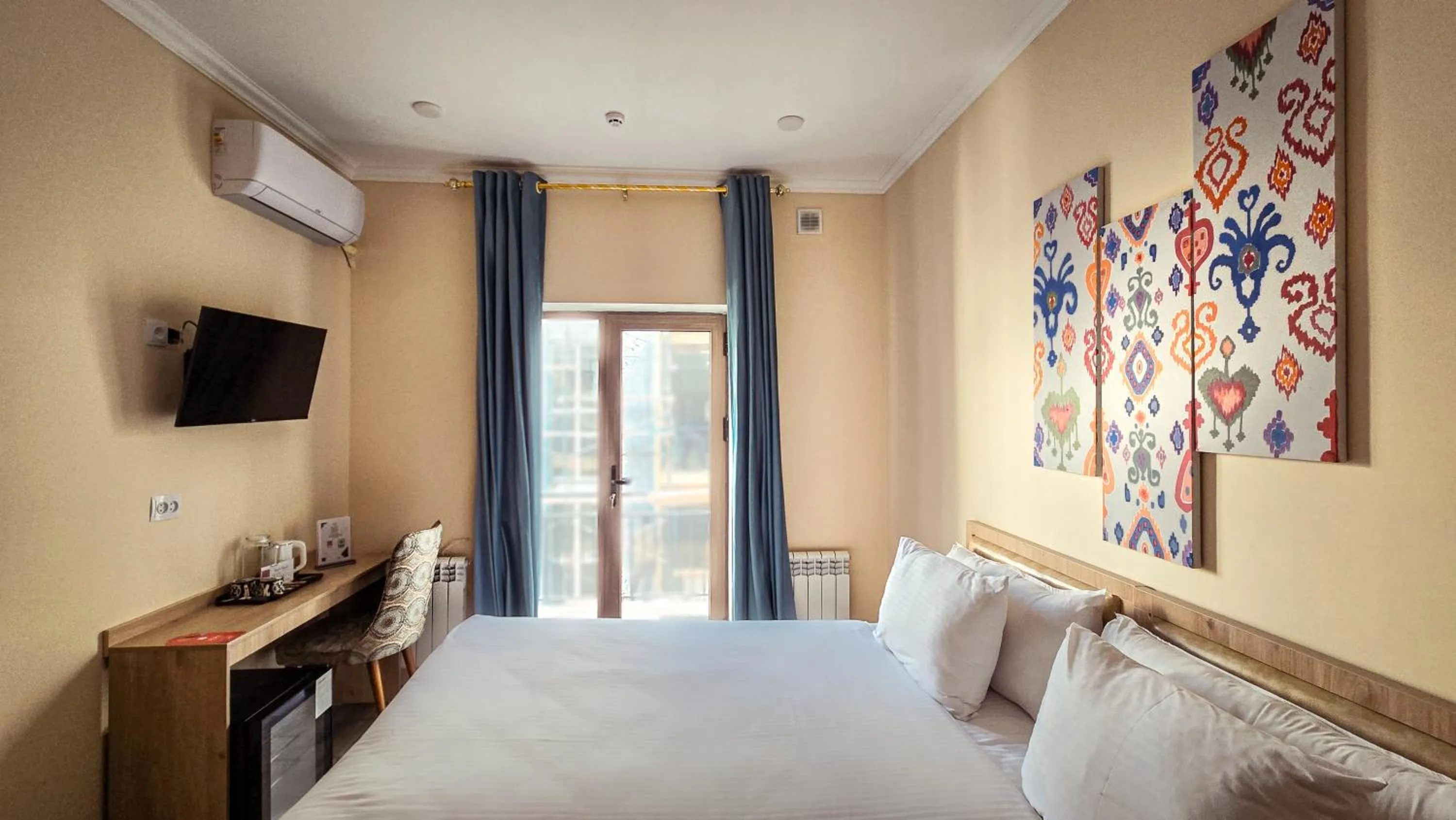 Bed in Hotel Bankir Khiva