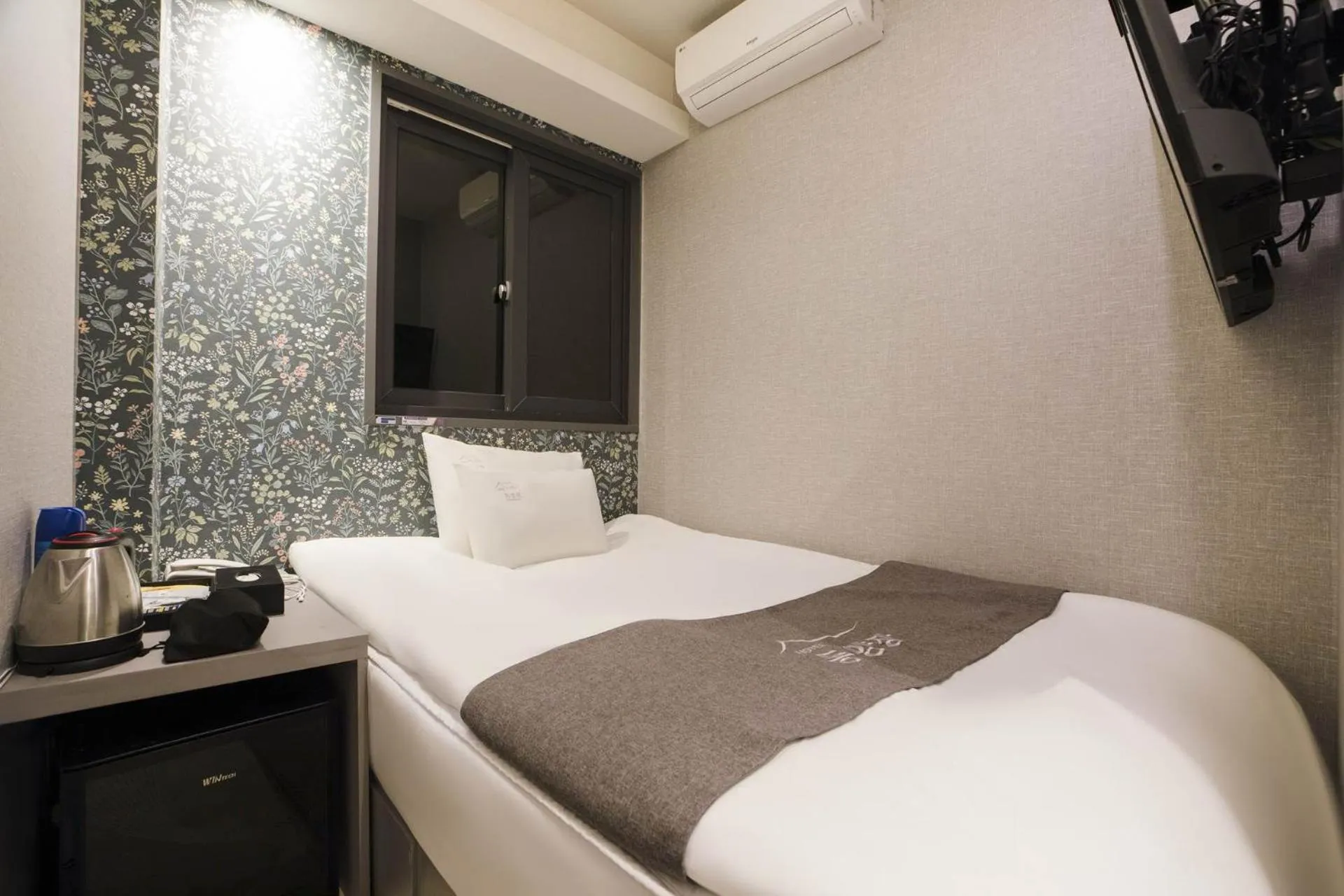 Bed in Hotel dongyangjang Dongdaemun-Jongno