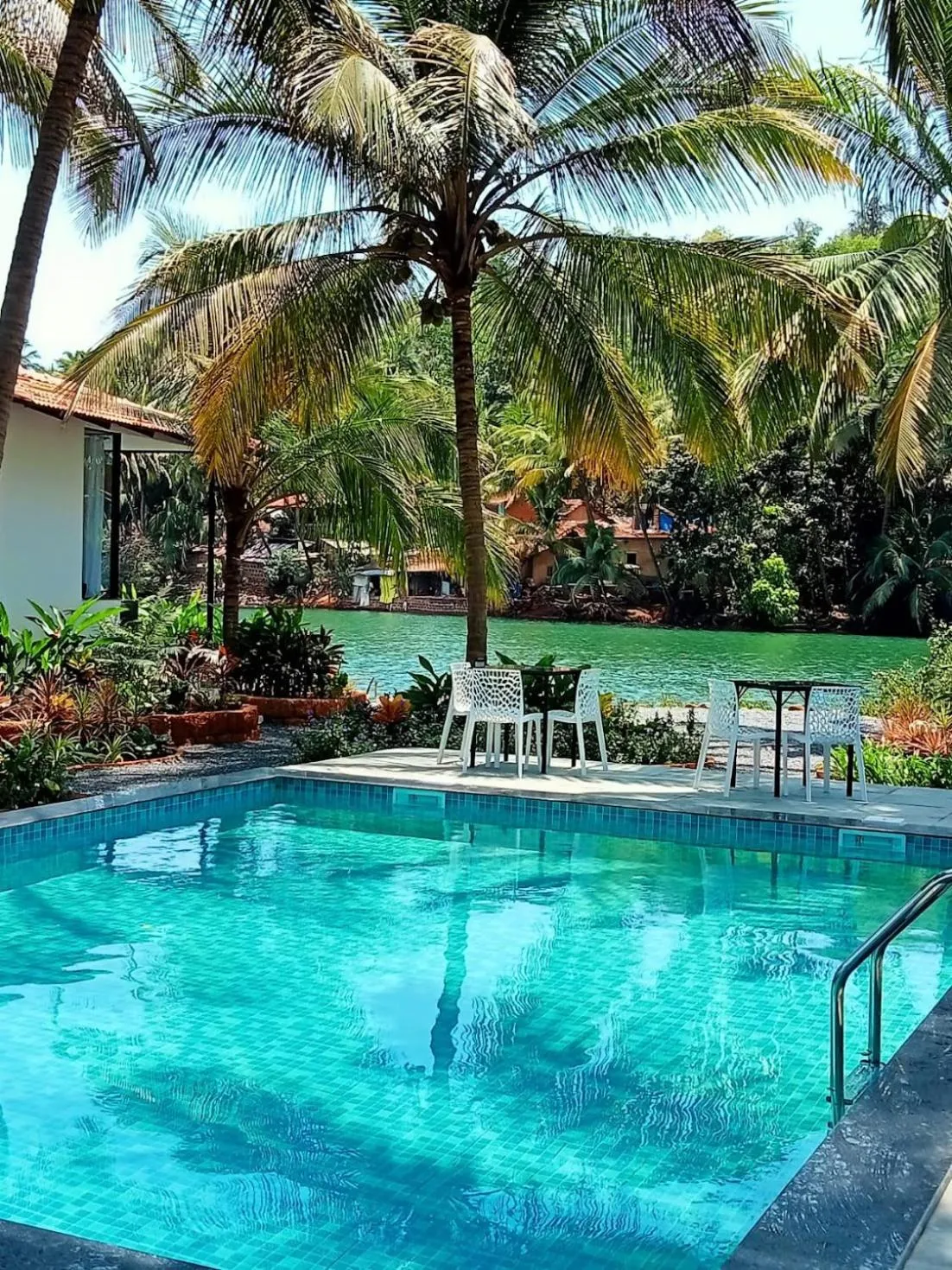 Swimming pool in Pont Bleu Suites Riverside & Pool