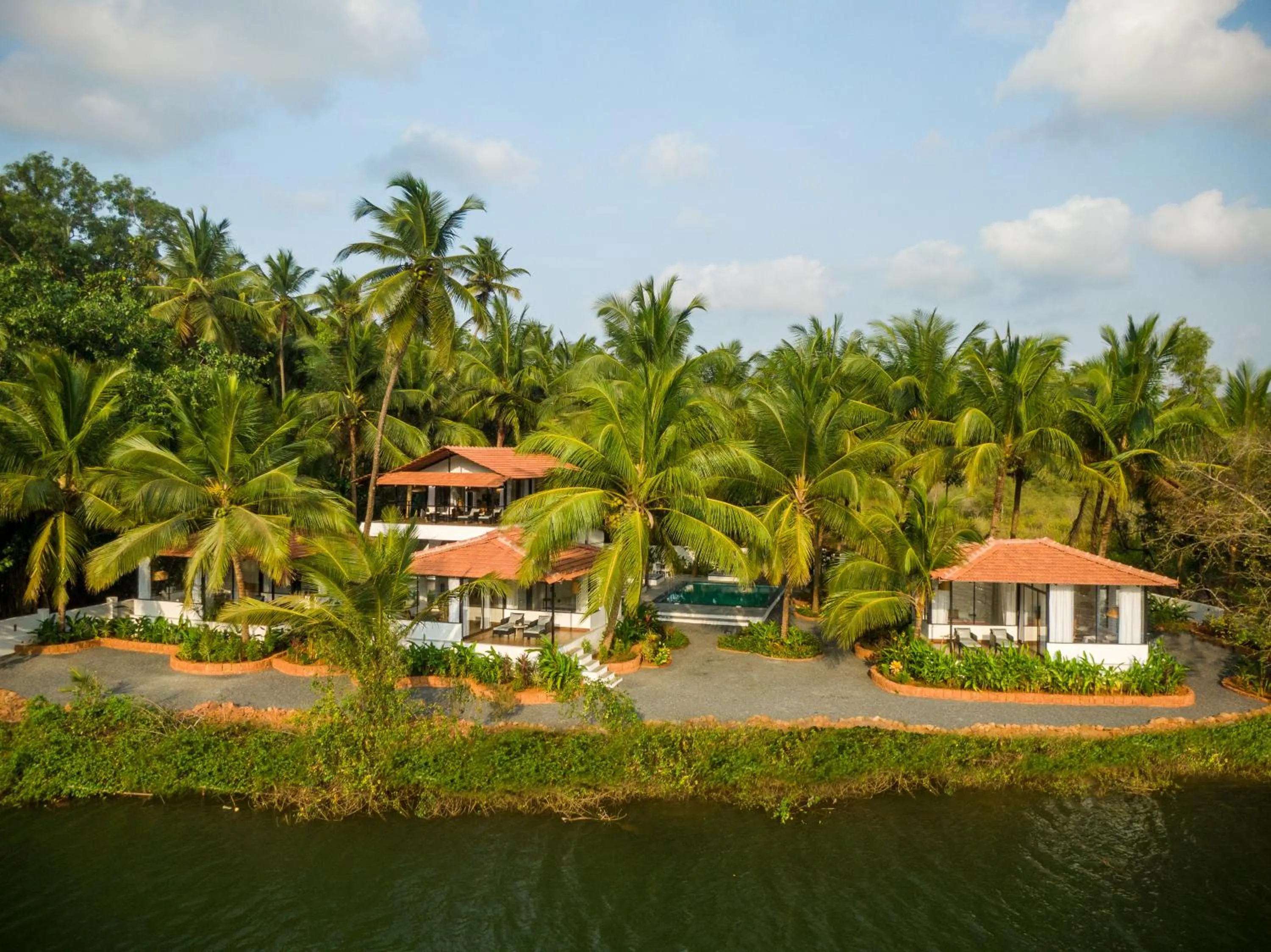 Property building in Pont Bleu Suites Riverside & Pool