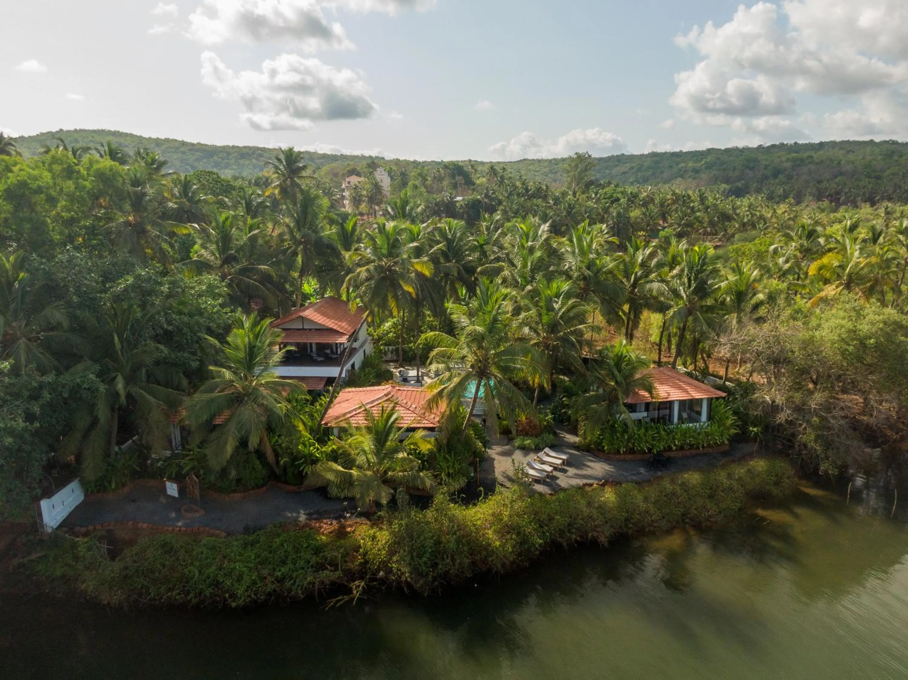 Property building in Pont Bleu Suites Riverside & Pool