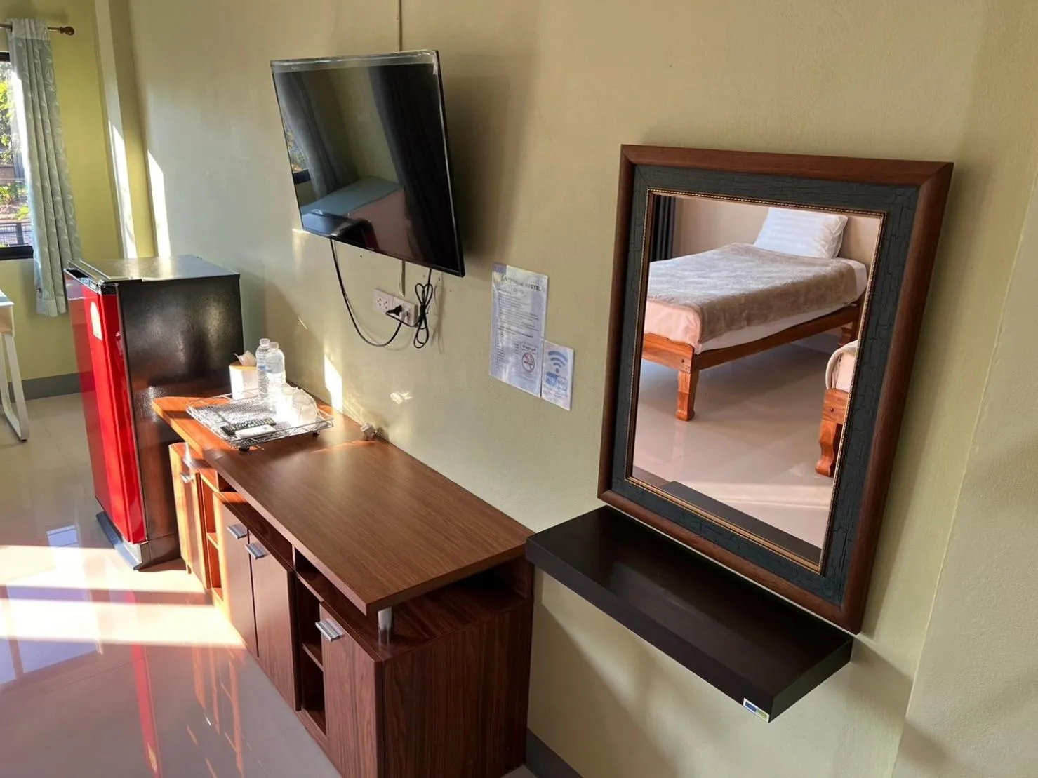 Bed in V Tharm Hotel