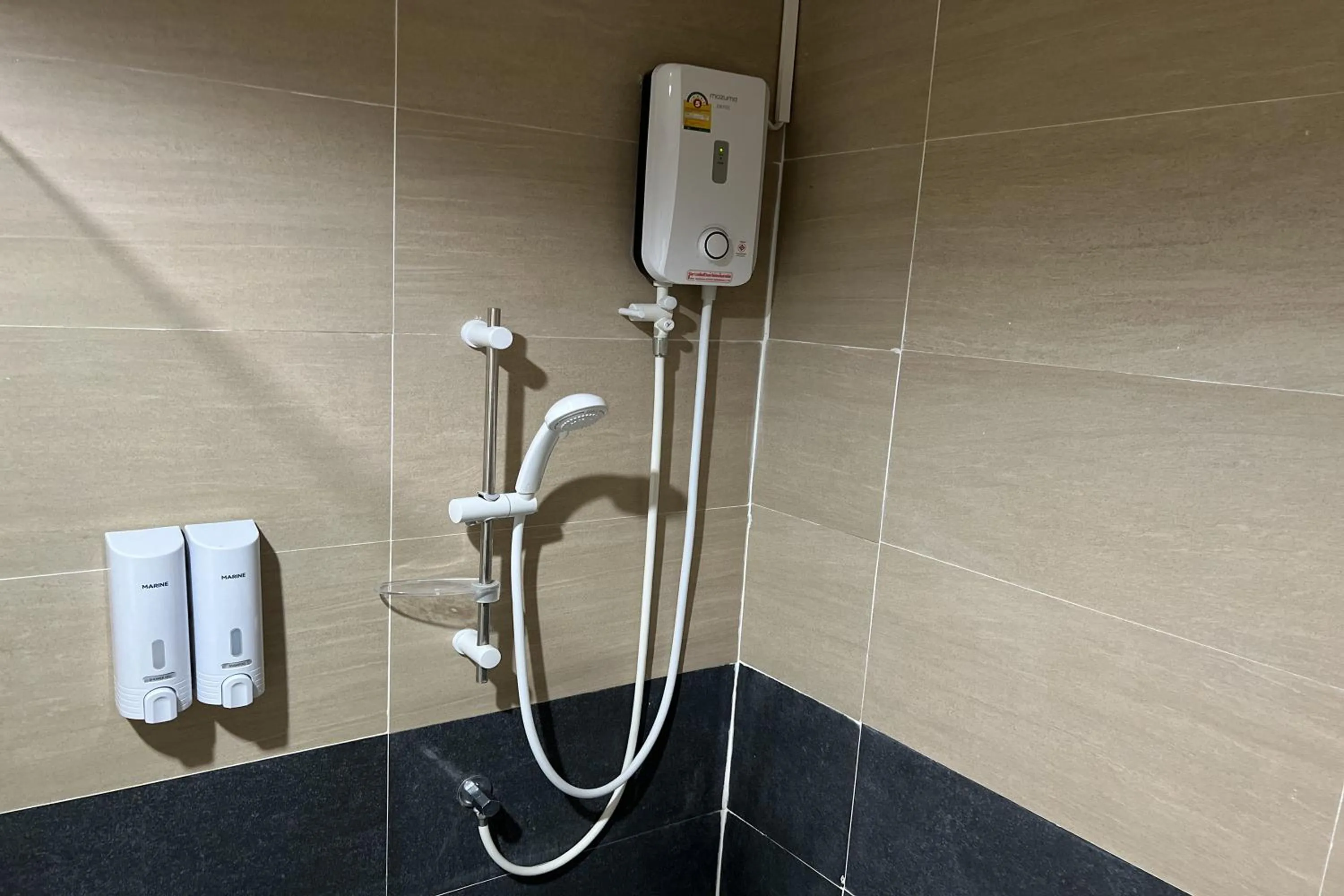 Shower in V Tharm Hotel