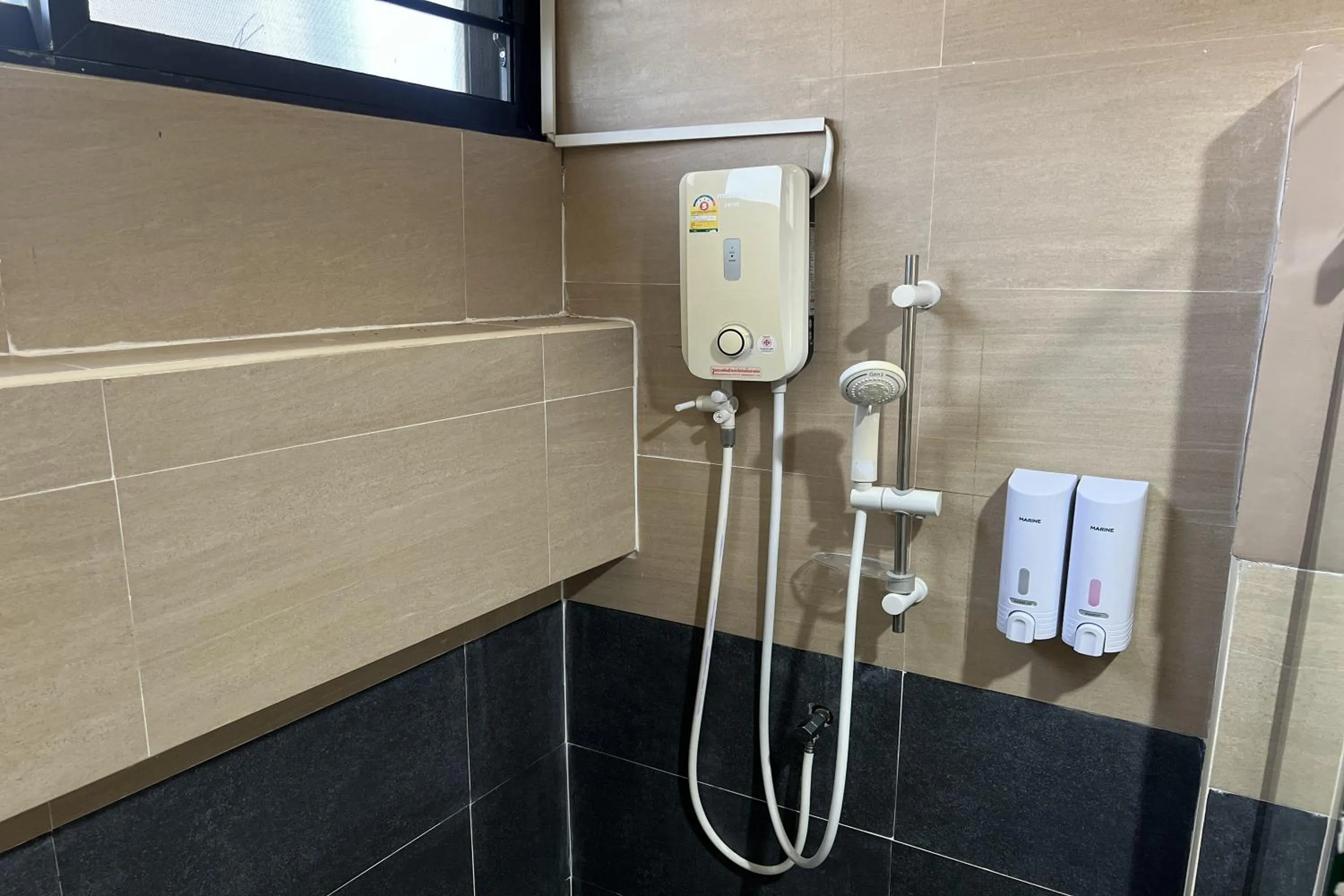 Shower in V Tharm Hotel