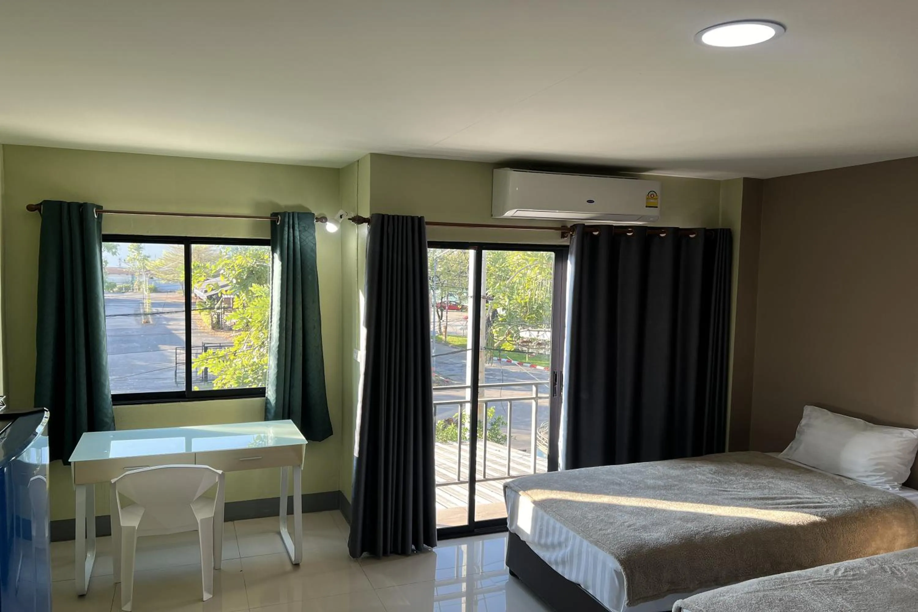 Bed in V Tharm Hotel