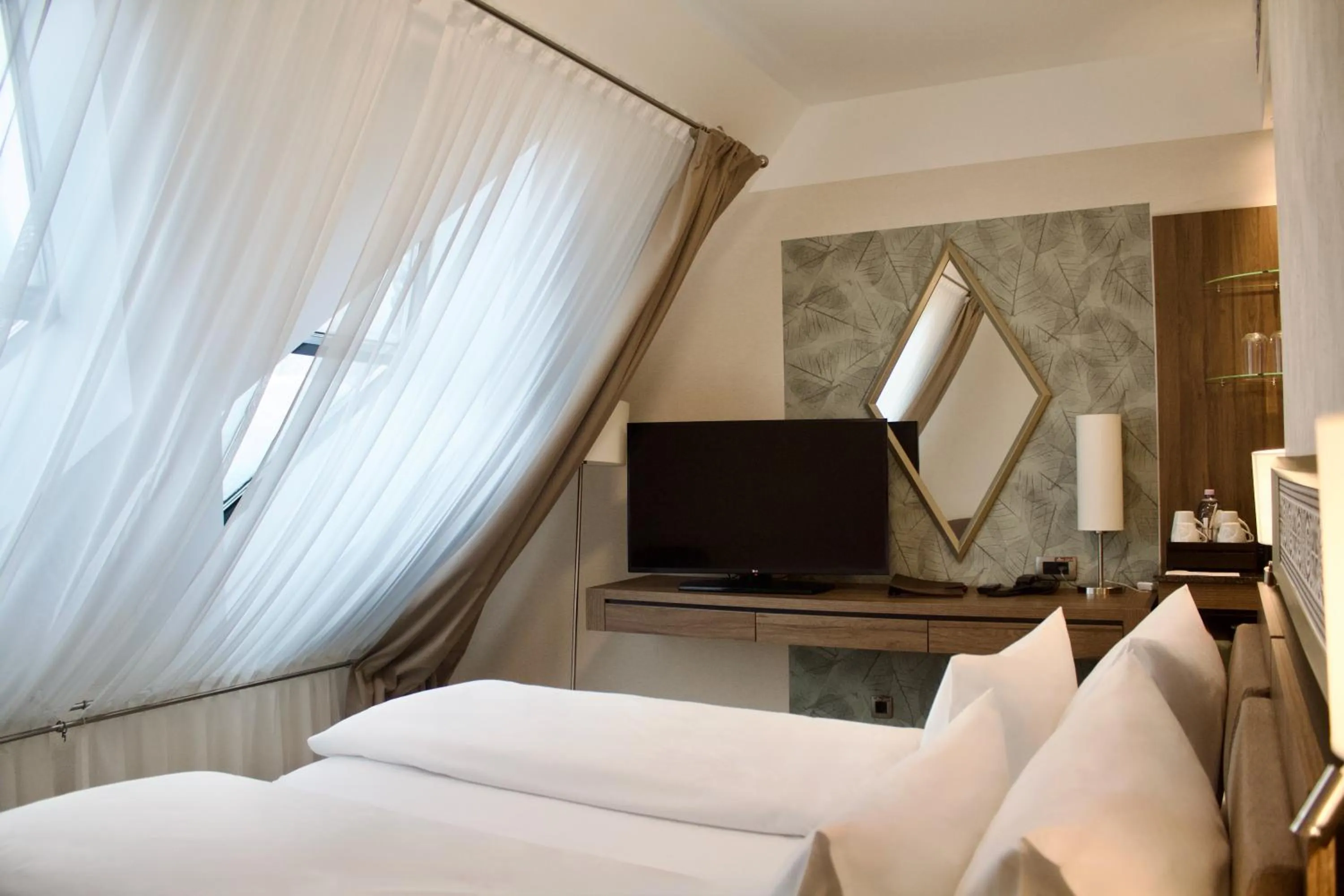 Bed in HOTEL CRYSTAL WELLNESS & SPA superior