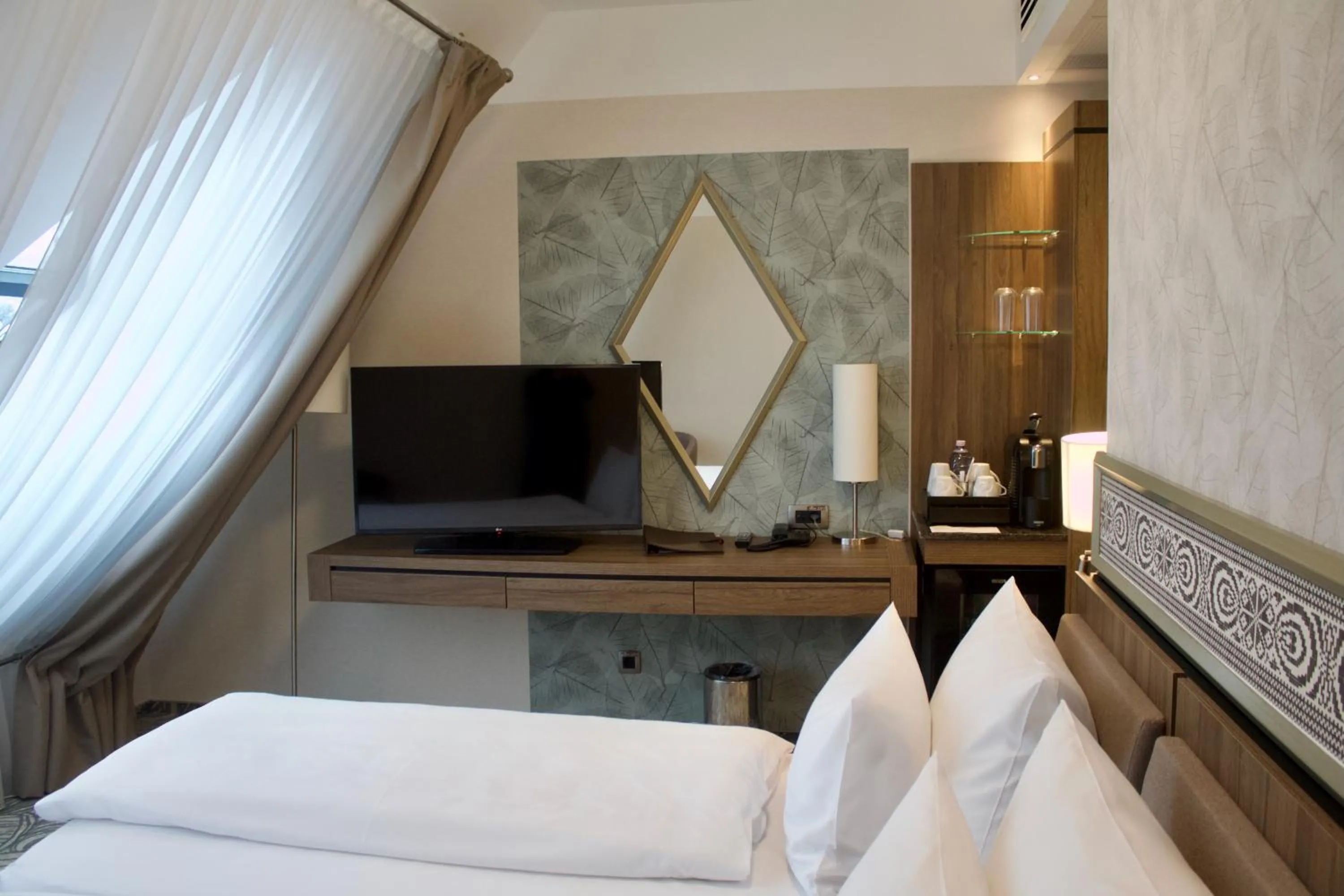 Bed in HOTEL CRYSTAL WELLNESS & SPA superior