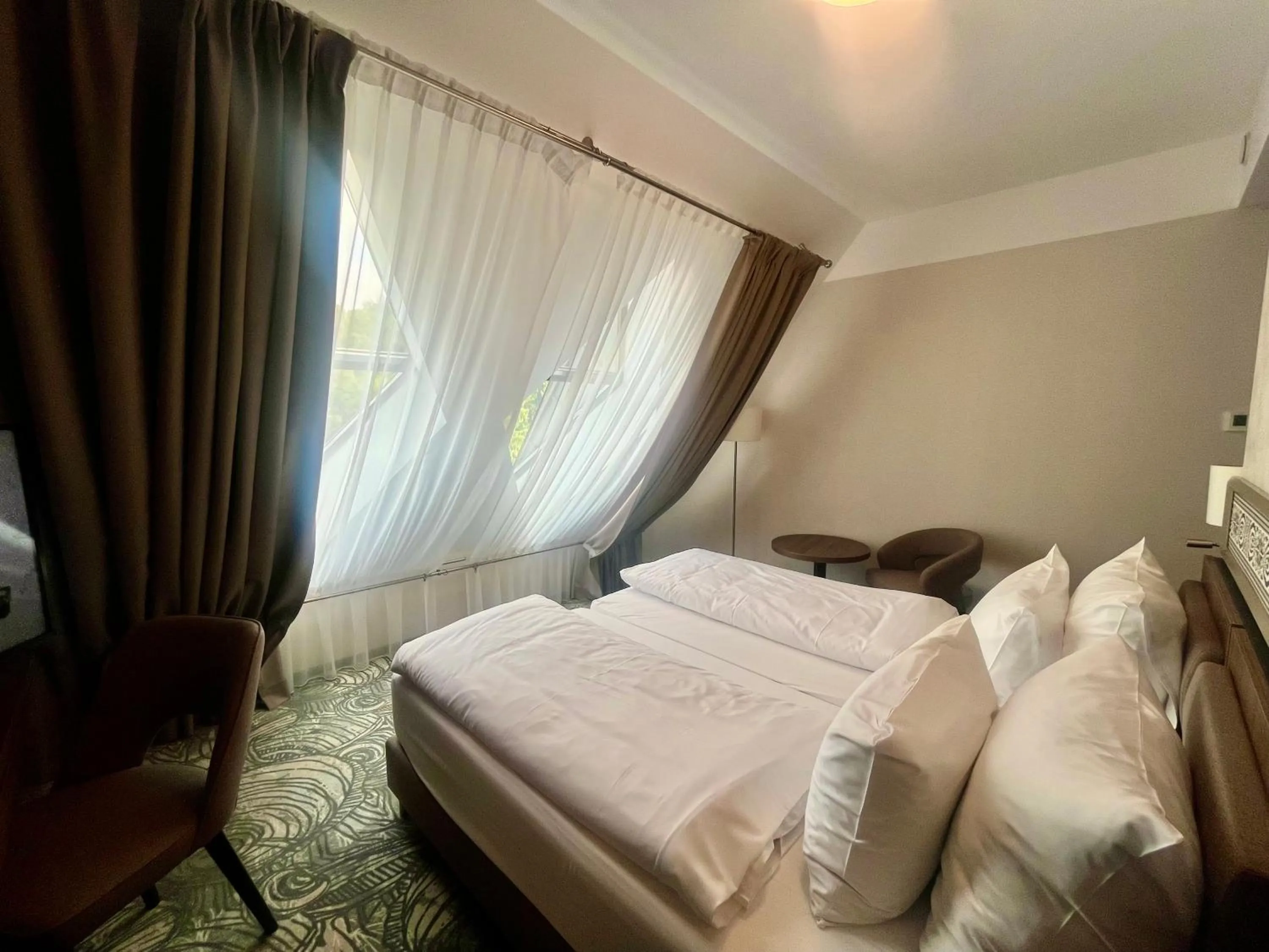 Bed in HOTEL CRYSTAL WELLNESS & SPA superior