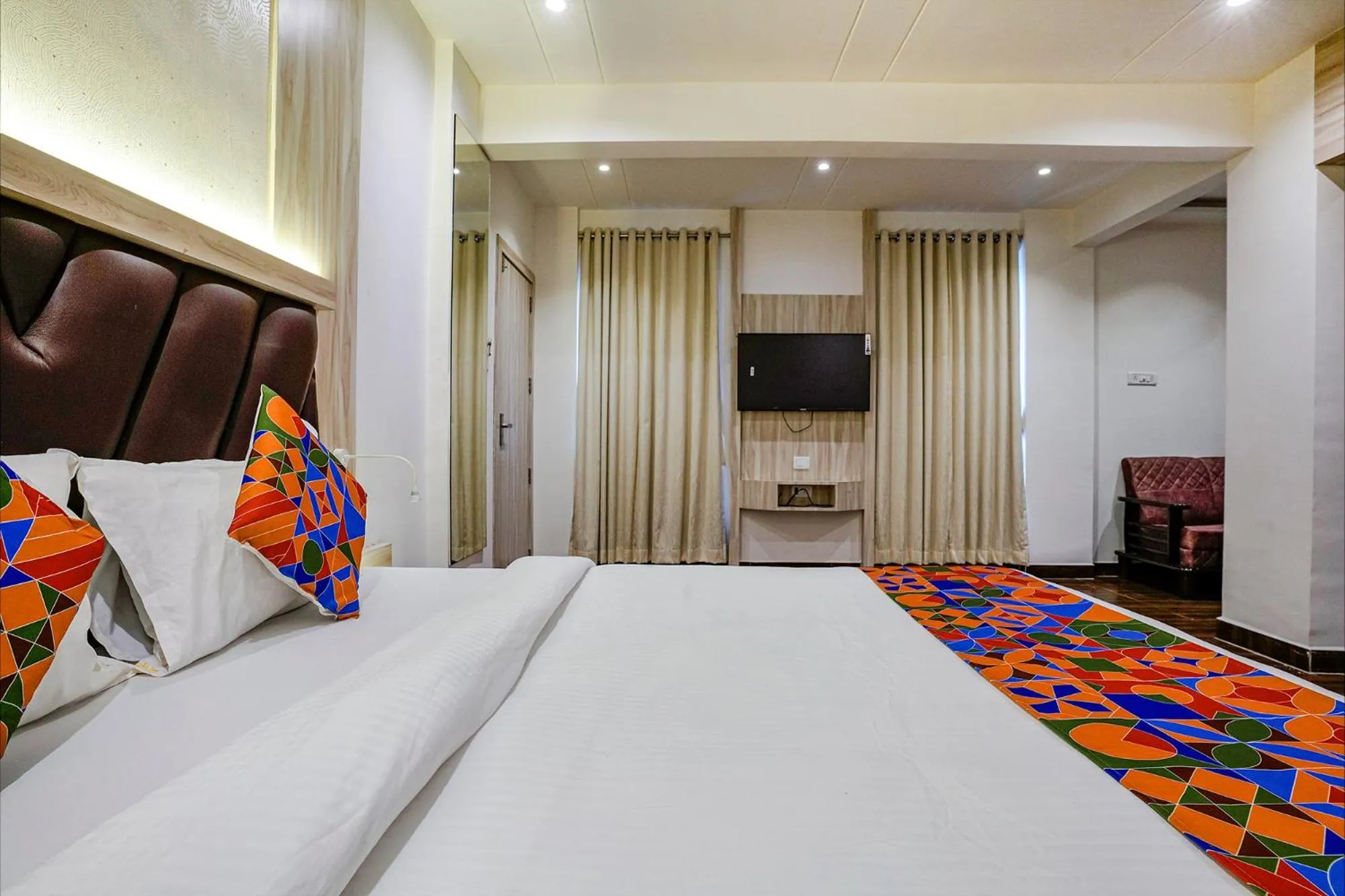 Bed in FabHotel Grand Residency