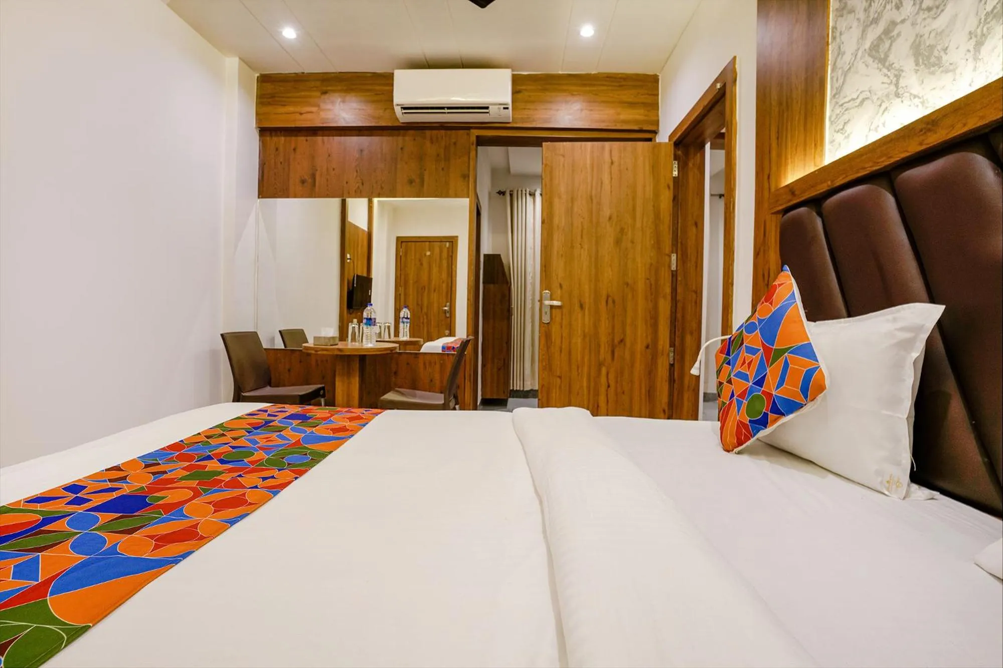 Bed in FabHotel Grand Residency