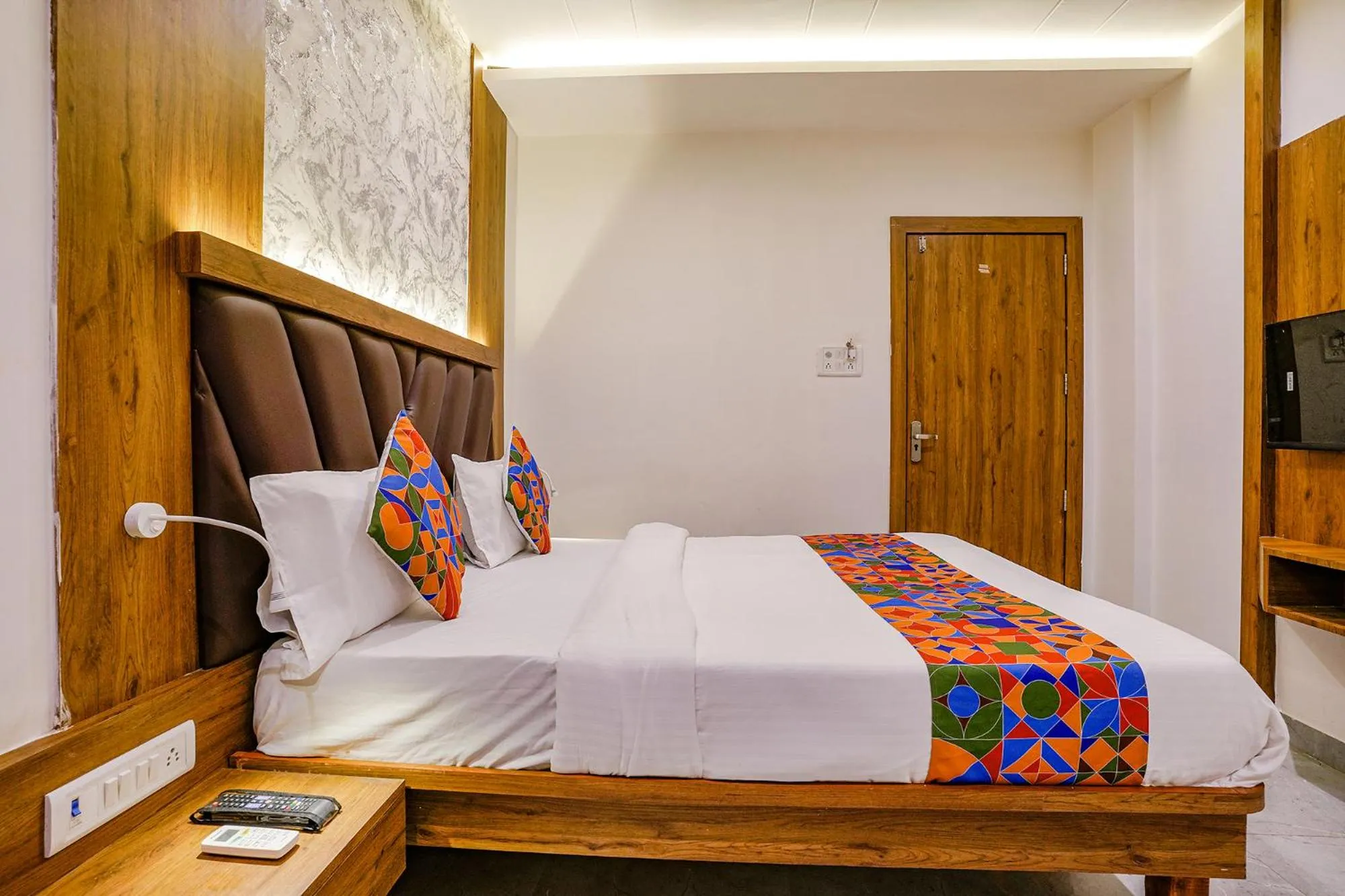 Bedroom in FabHotel Grand Residency