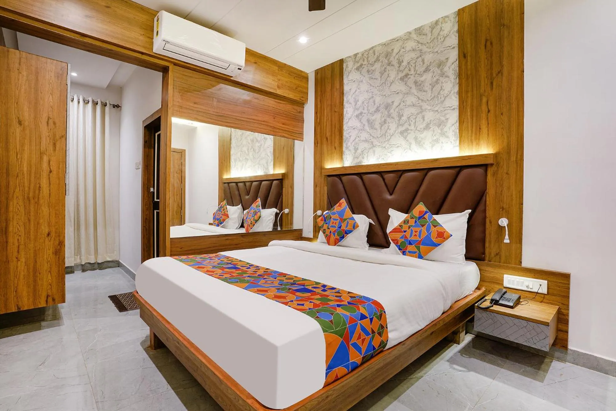 Bedroom in FabHotel Grand Residency