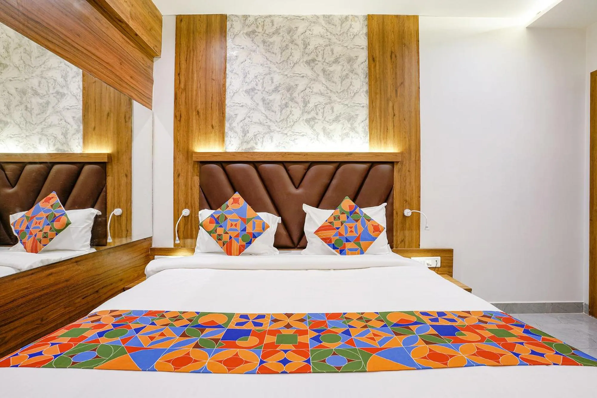 Bed in FabHotel Grand Residency
