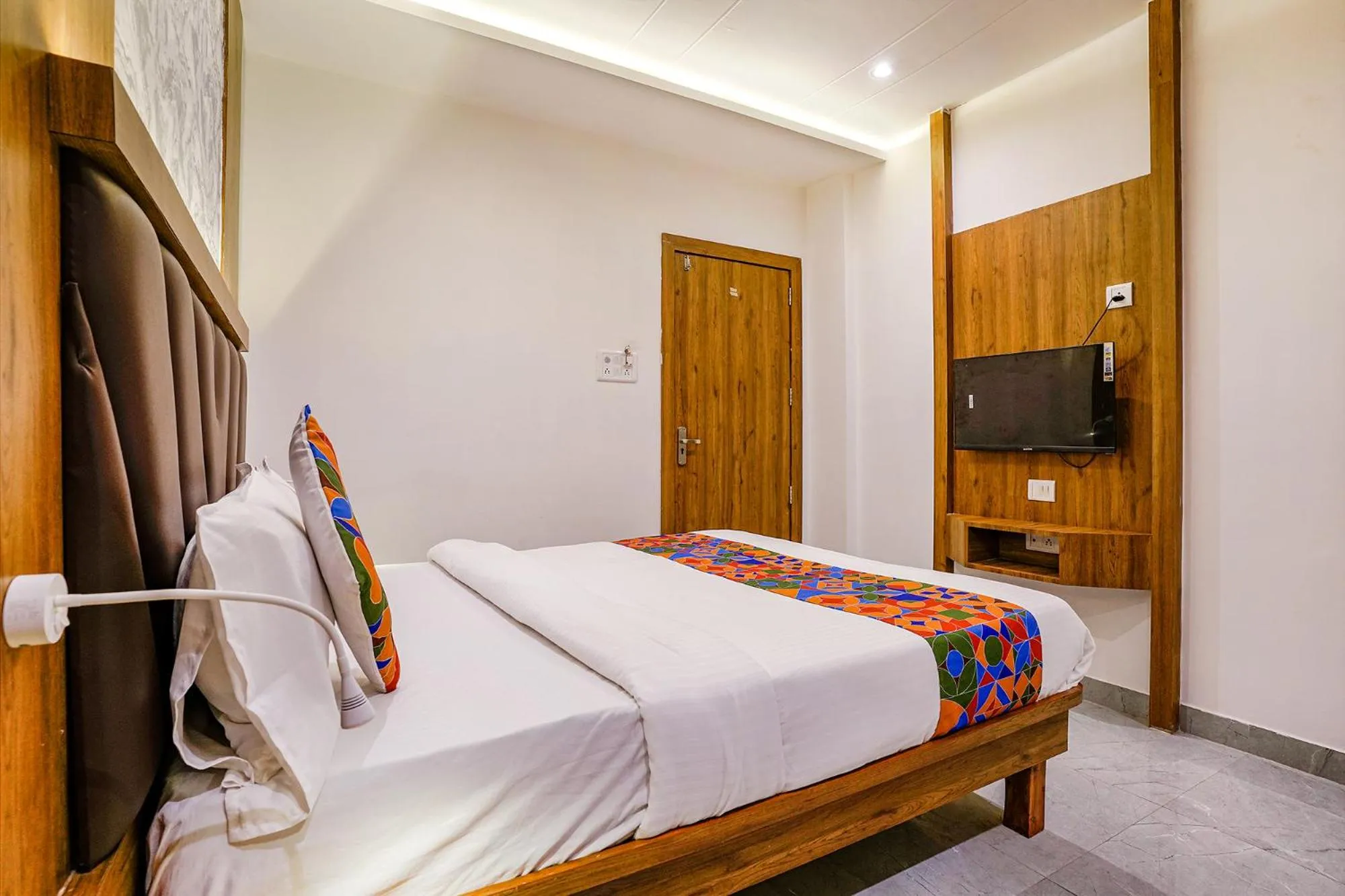 Bedroom in FabHotel Grand Residency