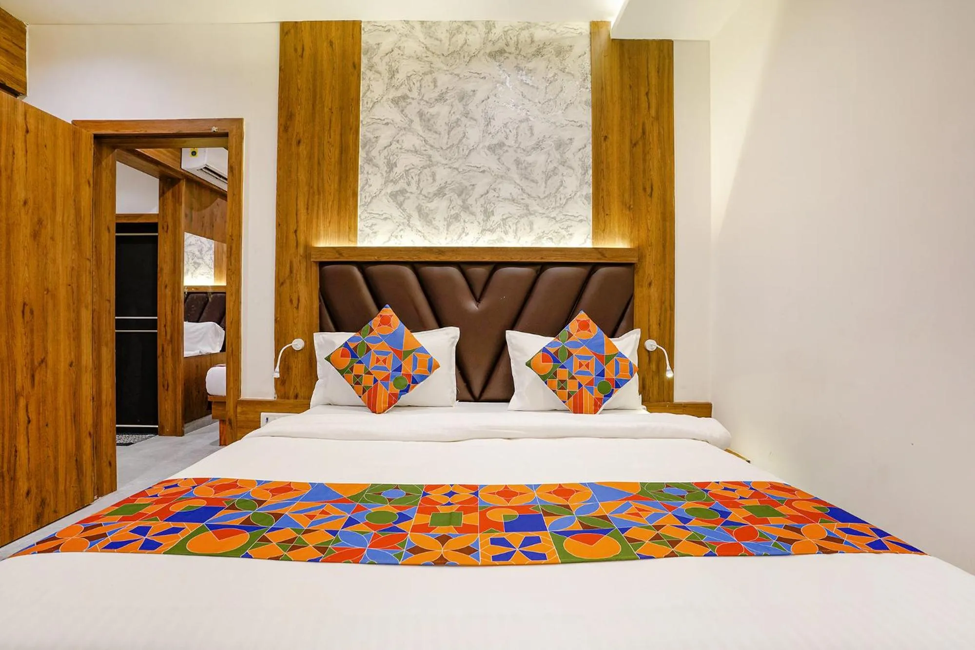 Bed in FabHotel Grand Residency
