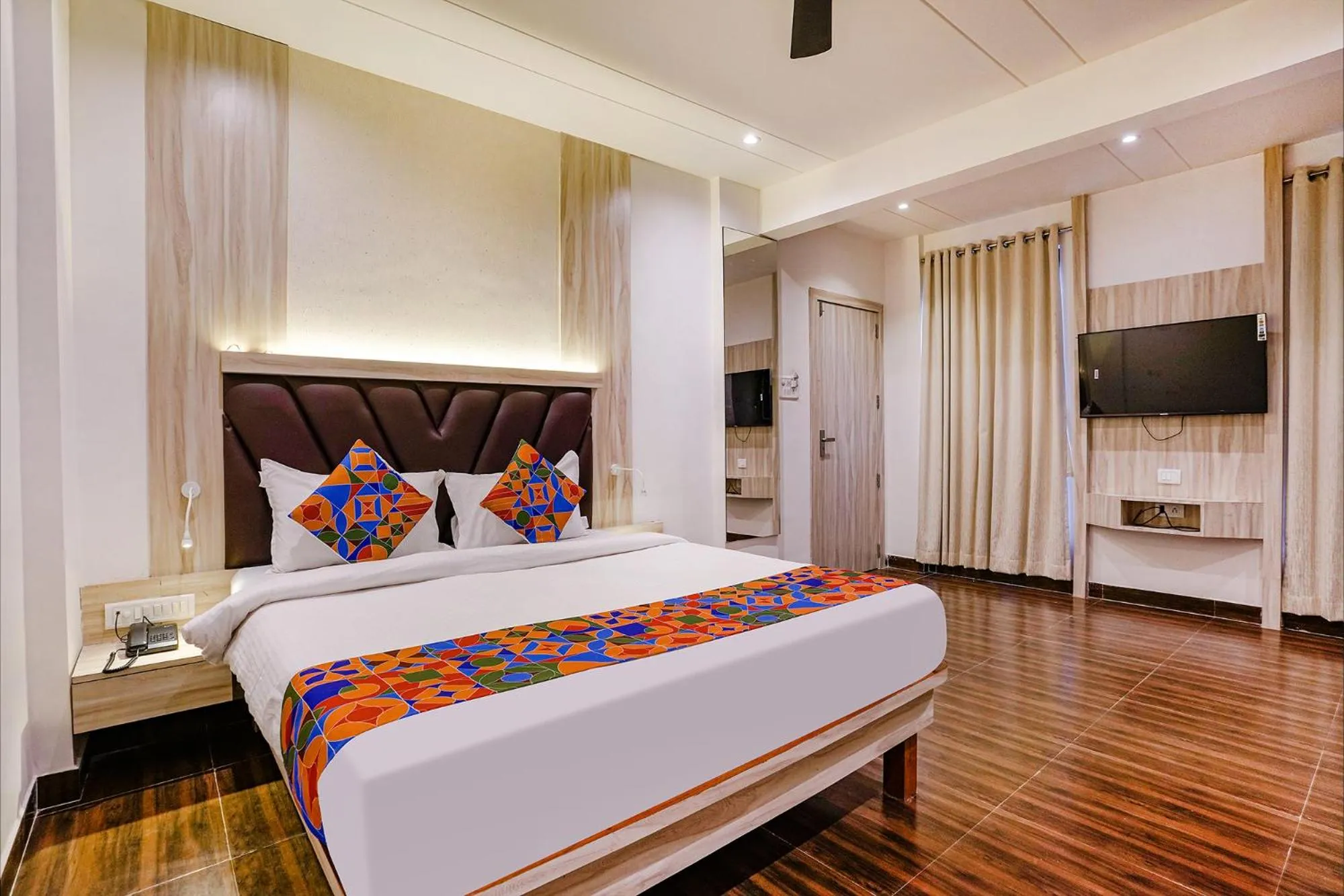 Bedroom in FabHotel Grand Residency