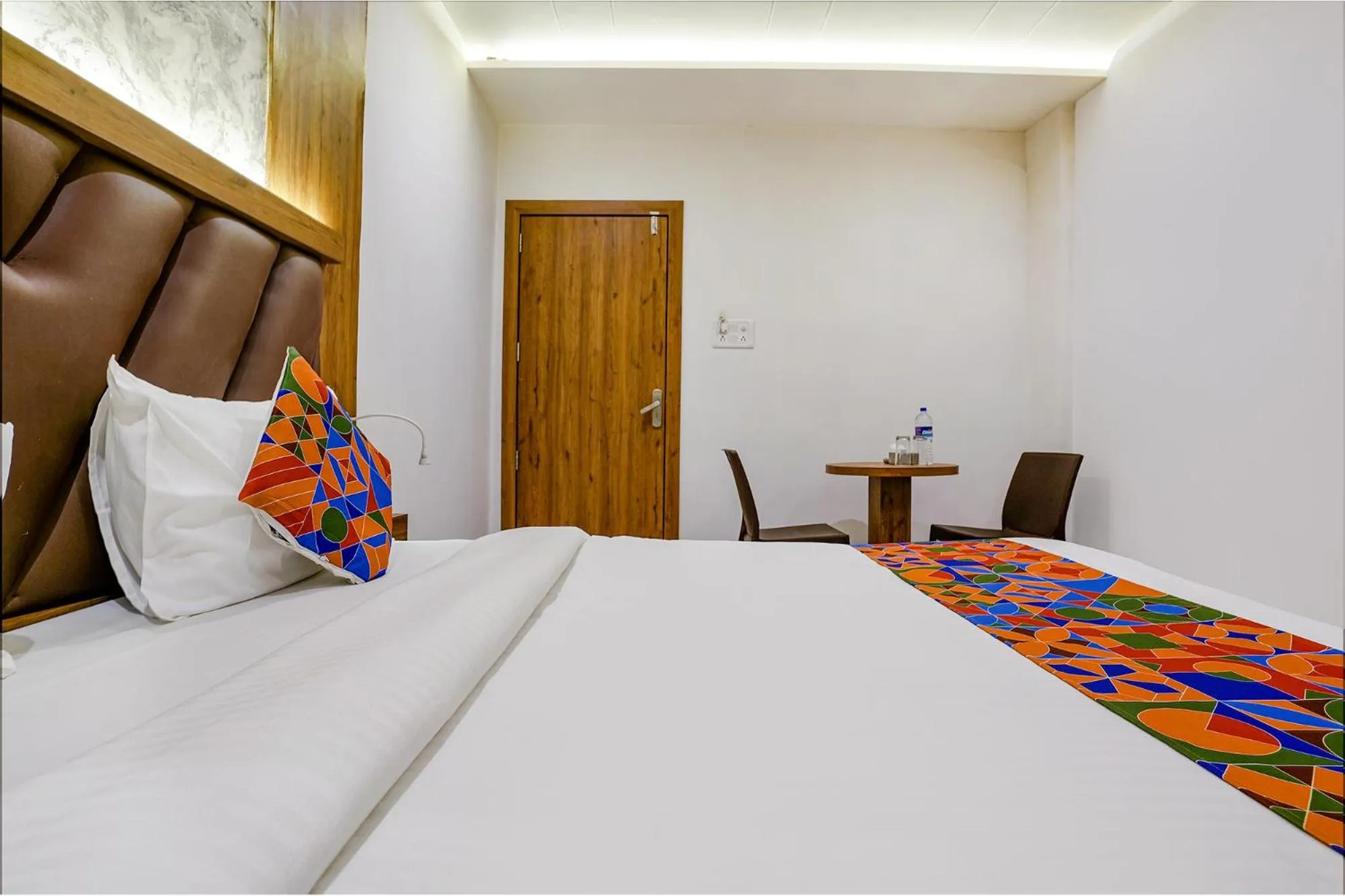 Bed in FabHotel Grand Residency