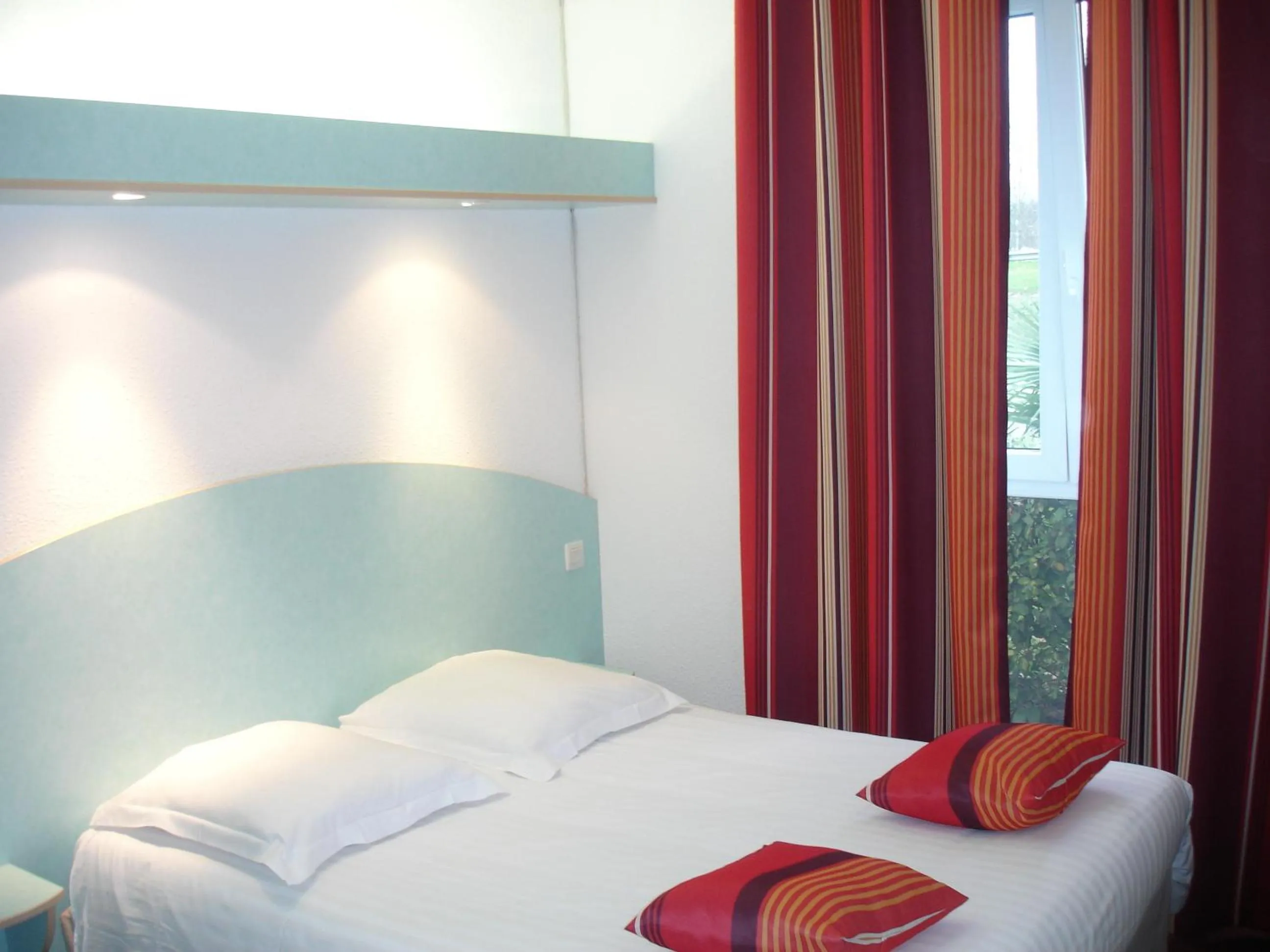 Photo of the whole room, Bed in Agape Hotel Niort- Bessines