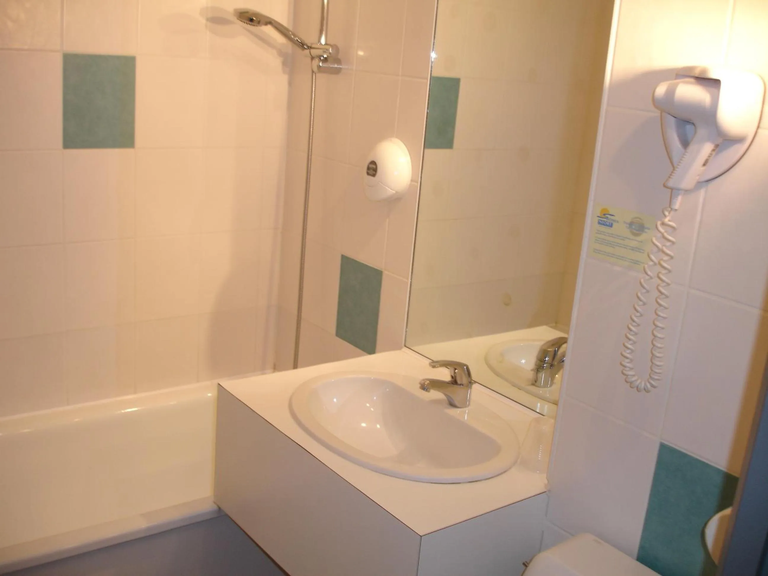 Bathroom in Agape Hotel Niort- Bessines