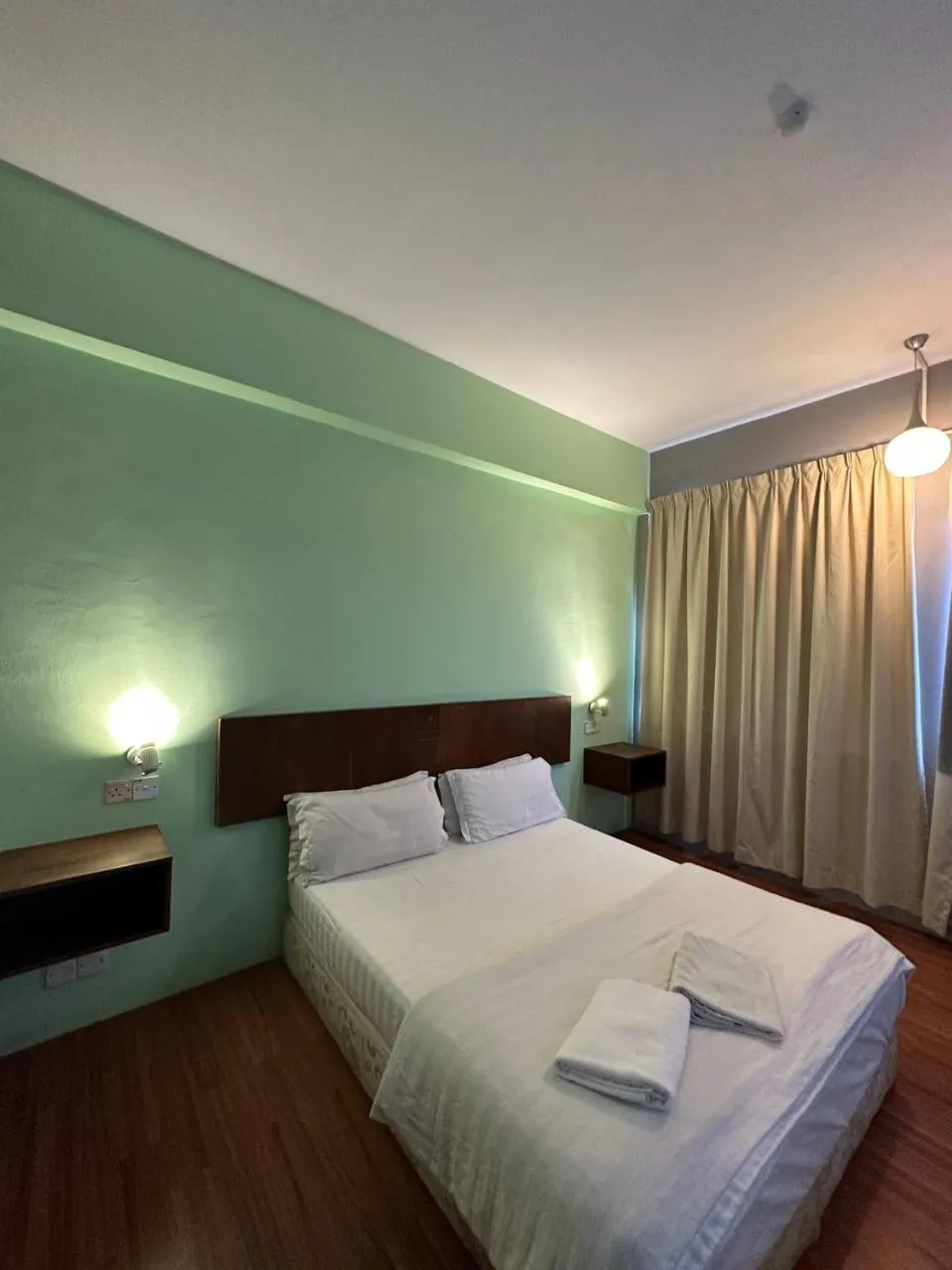 Bed in De Choice Hotel Tawau