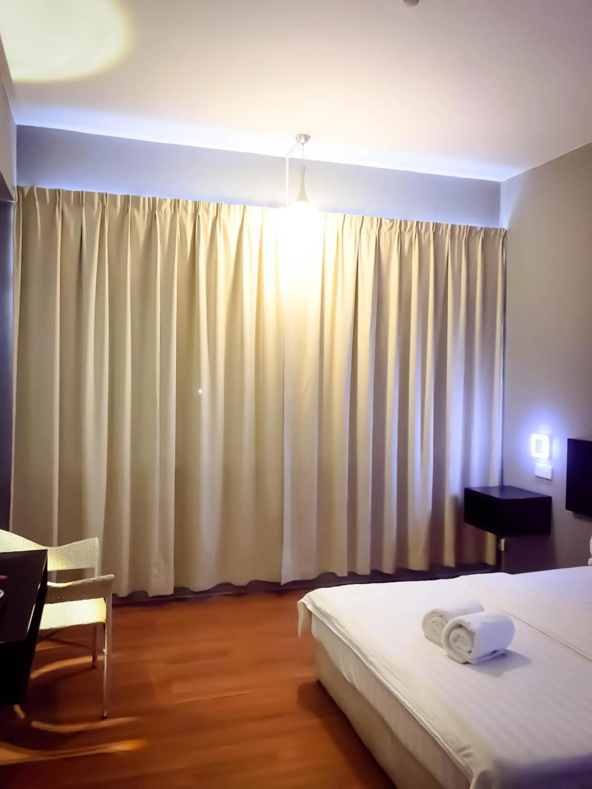 Bed in De Choice Hotel Tawau