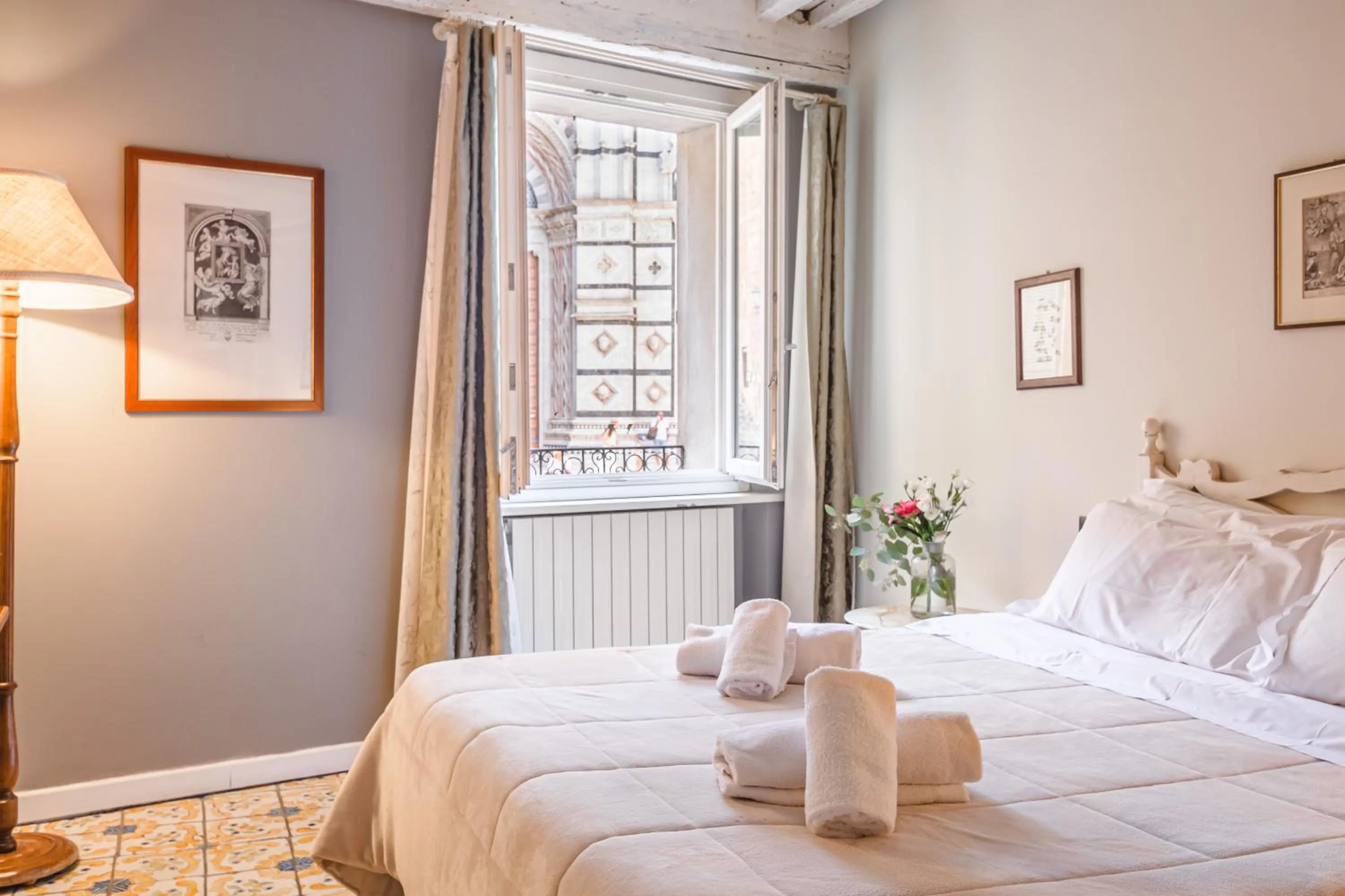 Bed in Il Battistero Siena Residenza d'Epoca