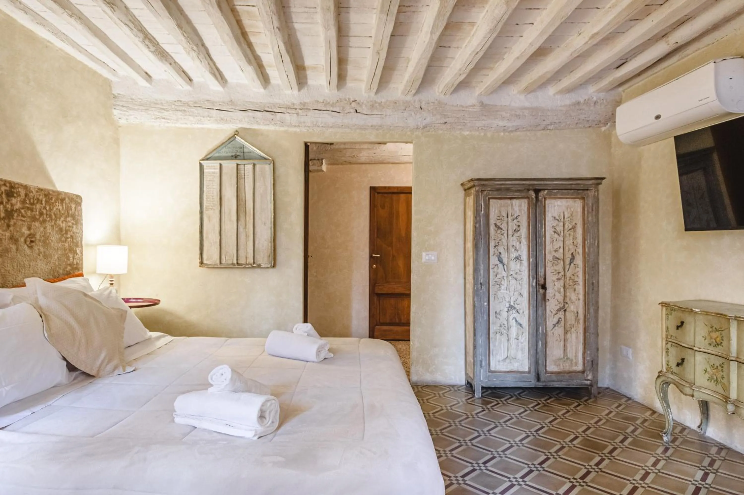 Bed in Il Battistero Siena Residenza d'Epoca