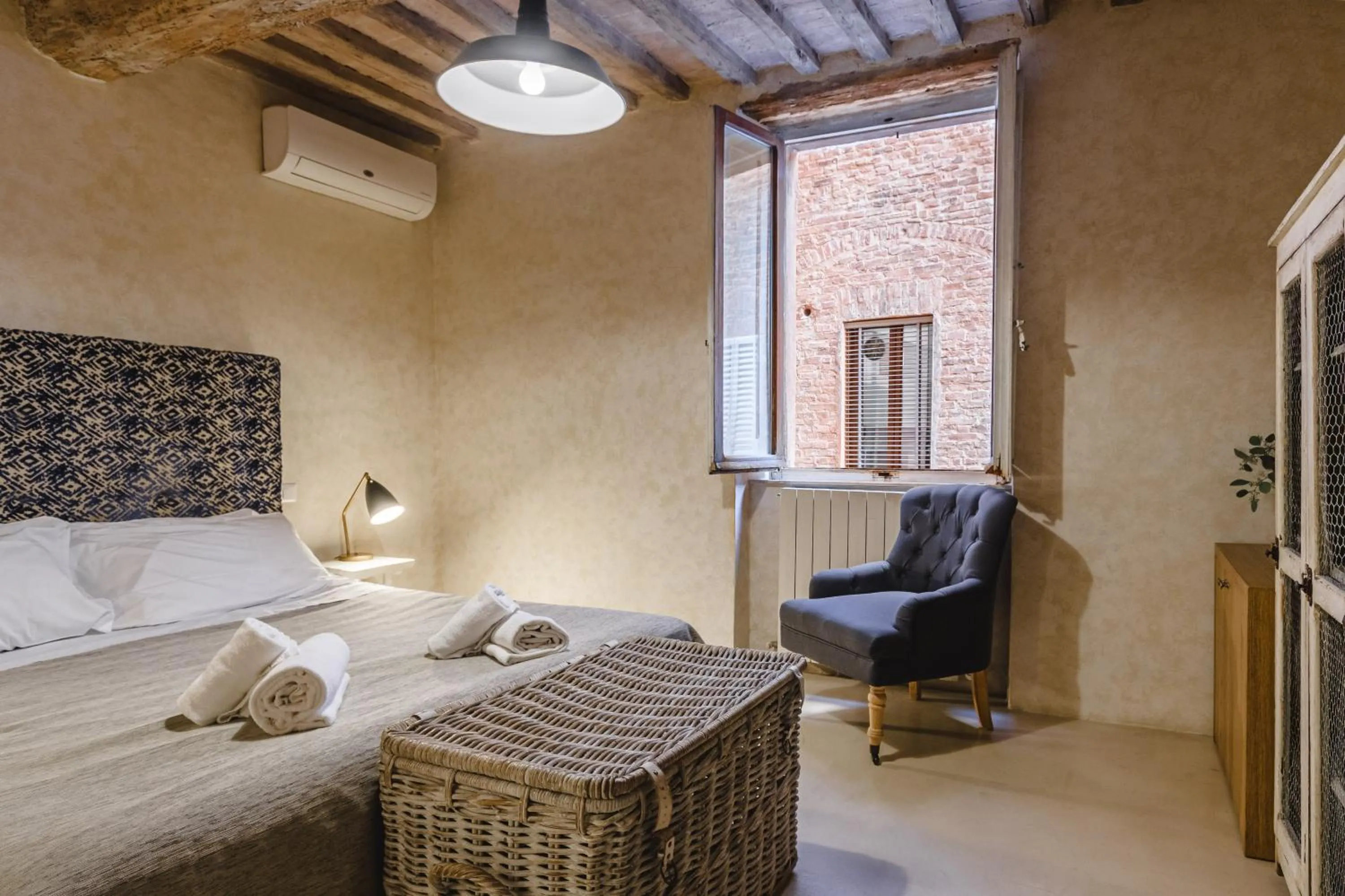 Bed in Il Battistero Siena Residenza d'Epoca